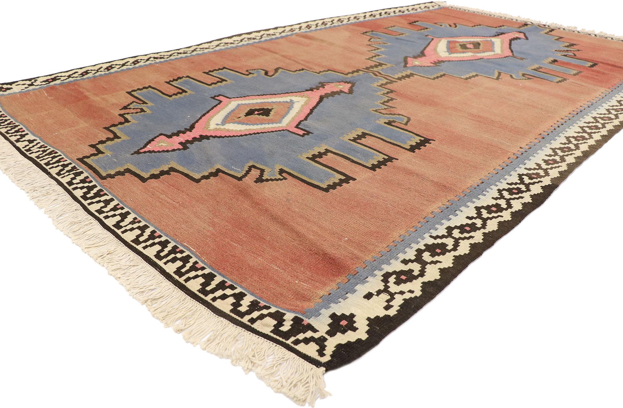 77953 Vintage Persian Bijar Kilim Rug, 05'05 x 09'03.
Embark on a captivating journey where modern boho chic converges seamlessly with the free-spirited allure of nomadic charm, intricately handwoven into the fabric of our vintage Persian Bijar