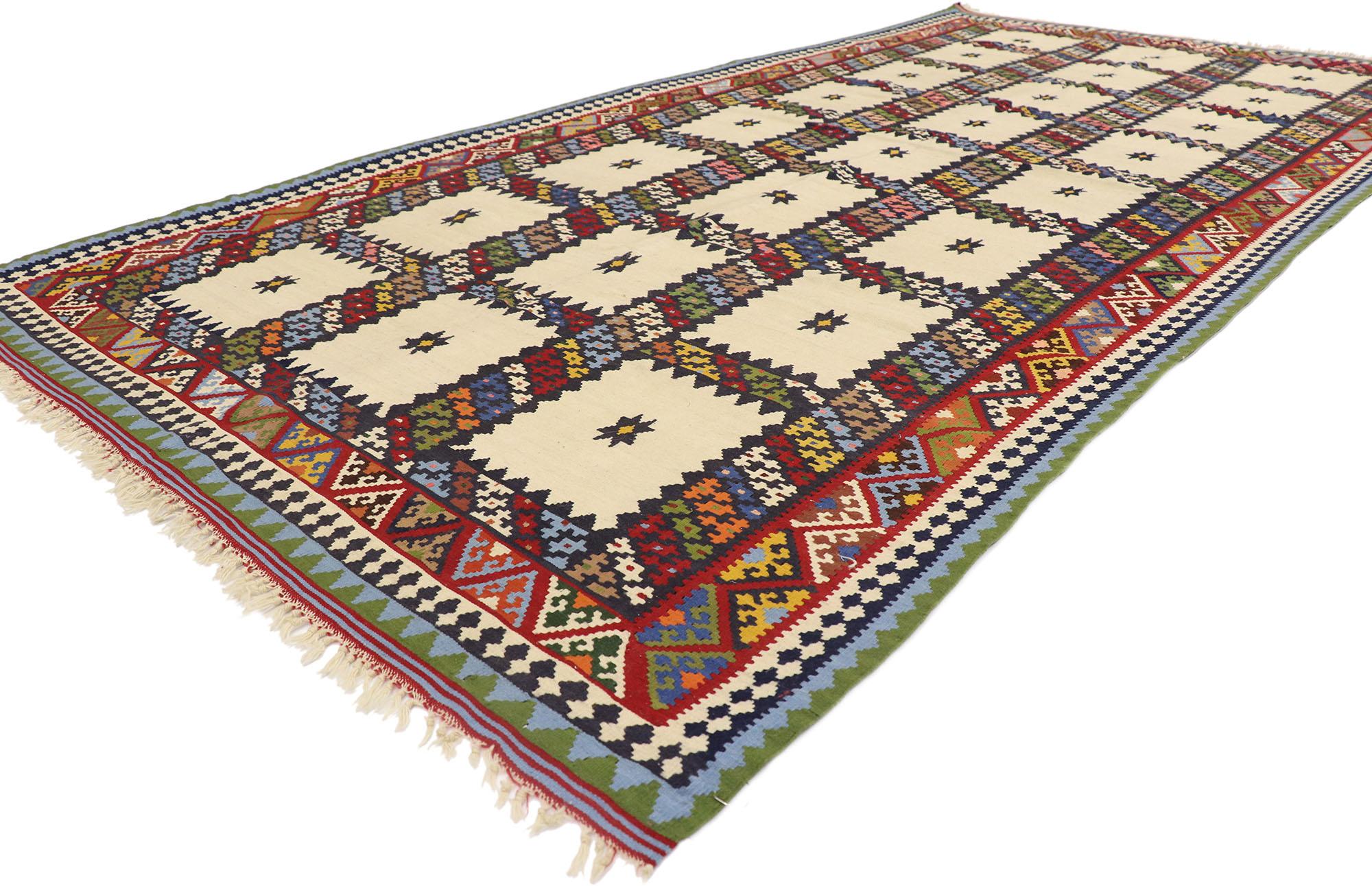 77941 Vintage Persian Bijar Kilim Rug, 04'11 x 09'08.

Embark on an enchanting journey where nomadic charm gracefully converges with tribal enchantment in our handwoven wool vintage Persian Bijar kilim rug. Rooted in tradition, this flatweave rug