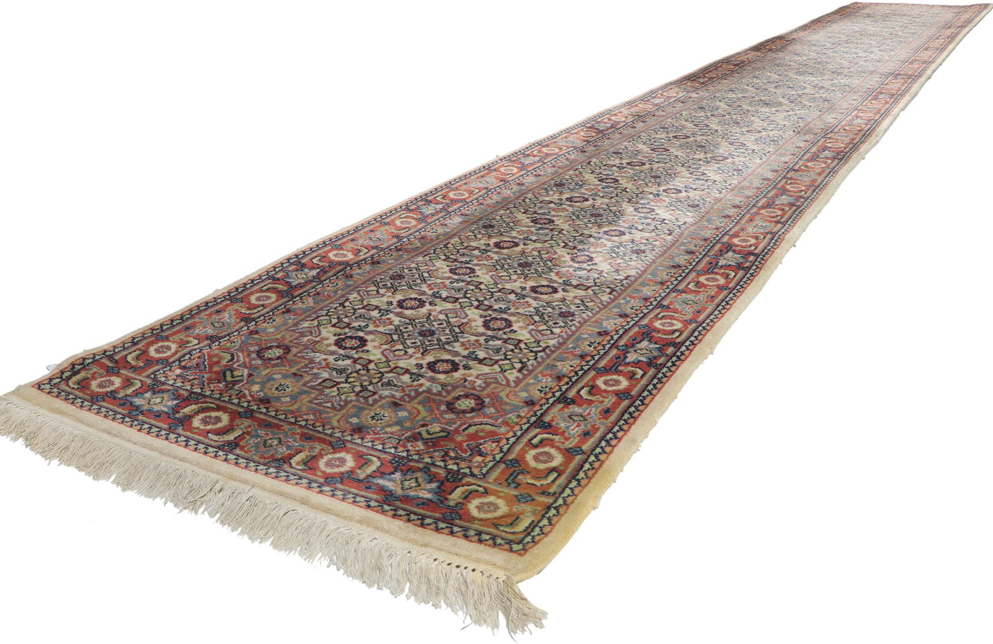 78298 Extra-Long Vintage Indian Bijar Runner, 02'08 x 19'07.
The hand-knotted wool vintage Indian Bijar rug runner combines traditional sensibility with bucolic charm. Its small-scale boteh design and light earthy hues intertwine to create a rustic