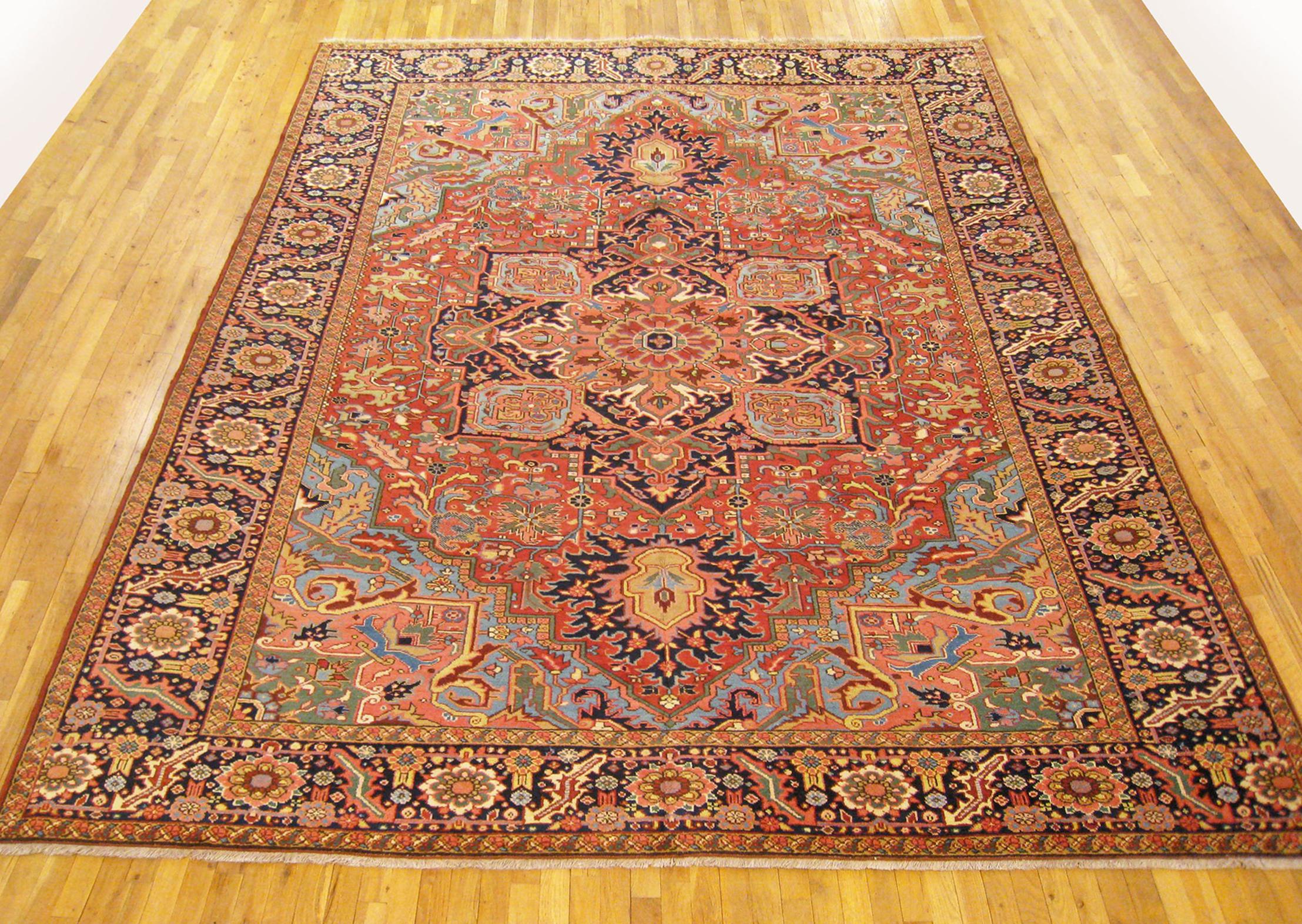 Vintage Persian Heriz Oriental rug, room size.

A vintage Persian Heriz oriental rug, size 12'4