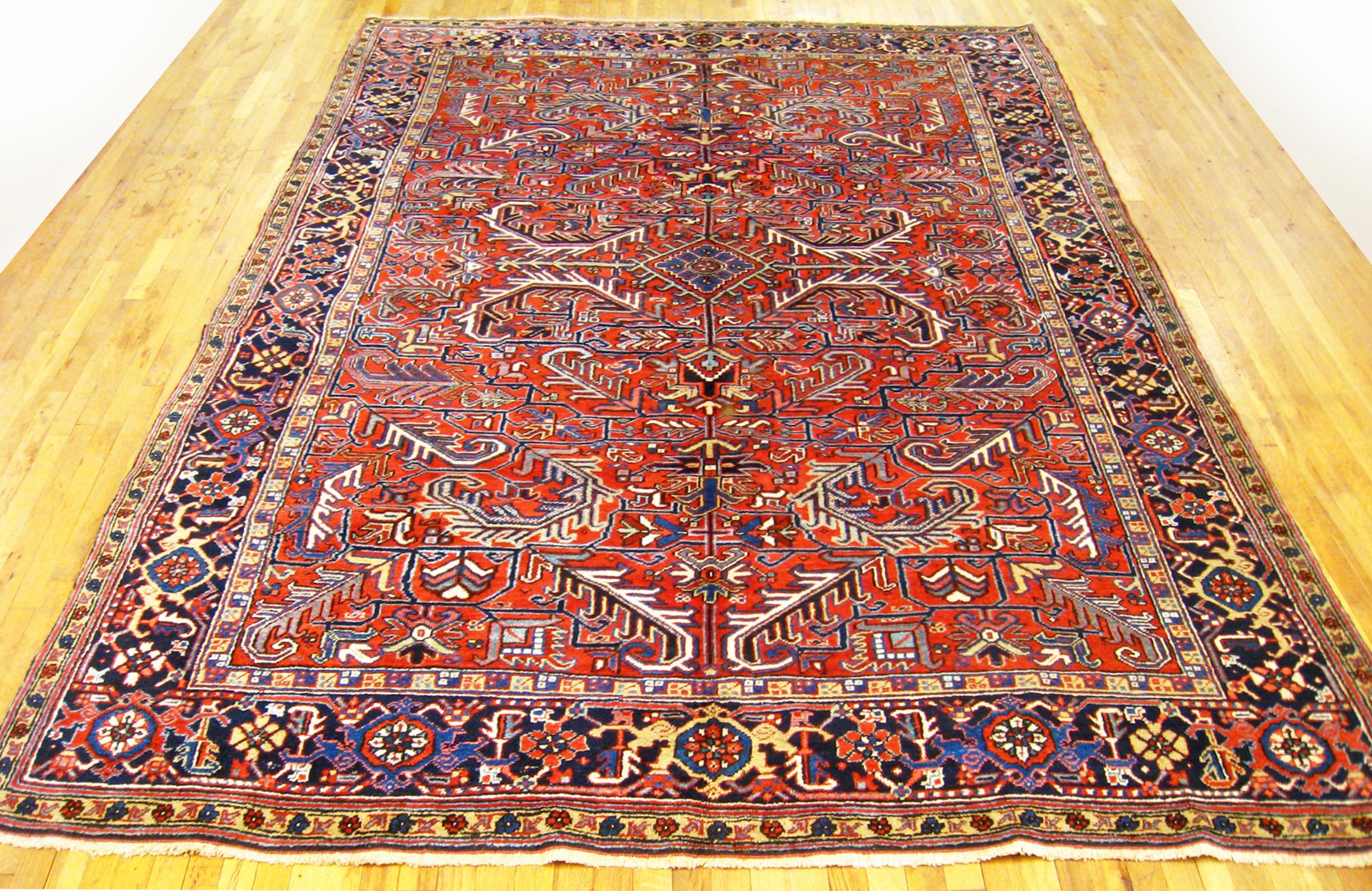 Vintage Persian Heriz Oriental Rug, Room size.

A vintage Persian Heriz oriental rug, size 11'0