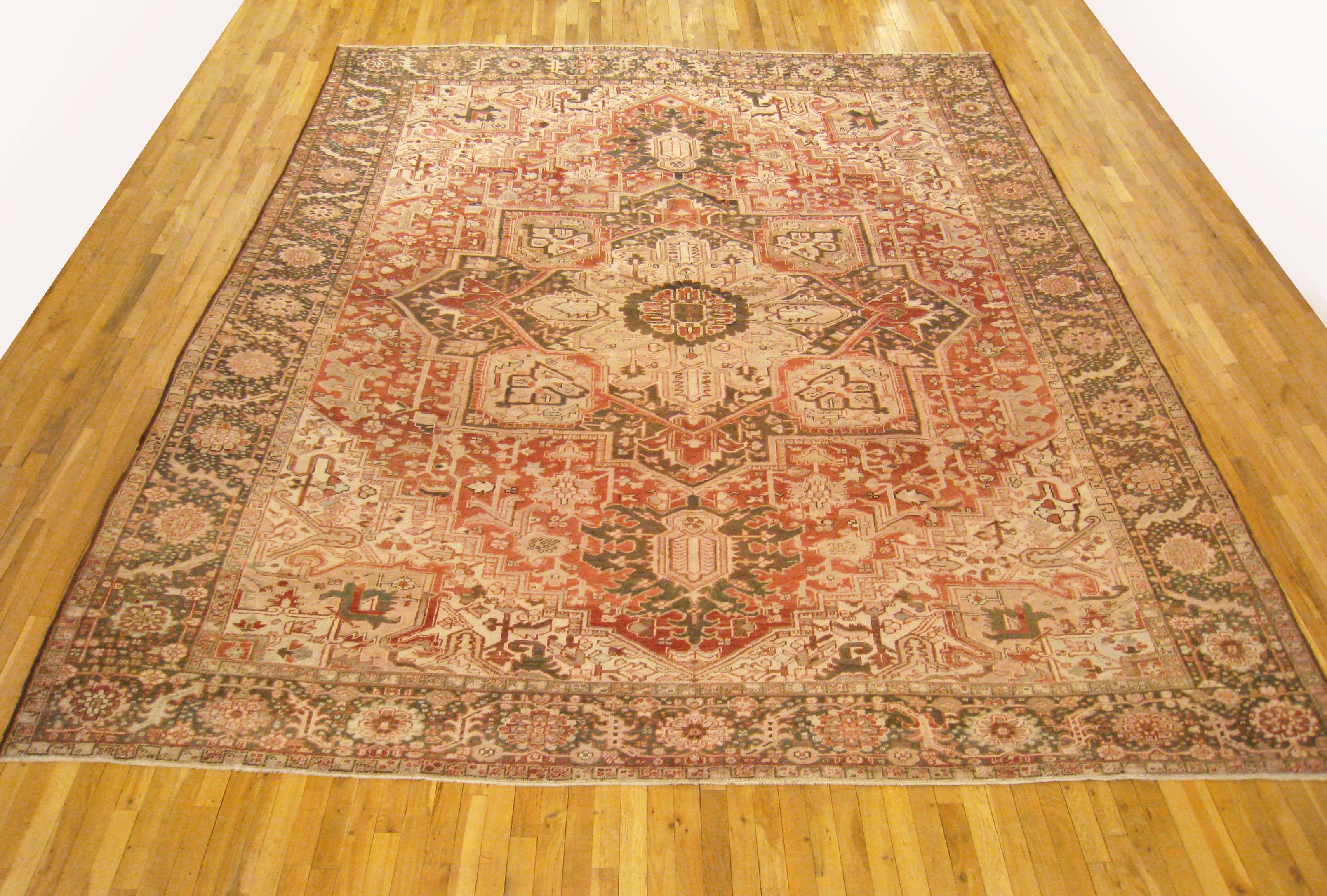 Vintage Persian Heriz Oriental rug, Room size

A vintage Persian Heriz oriental rug, size 13'2