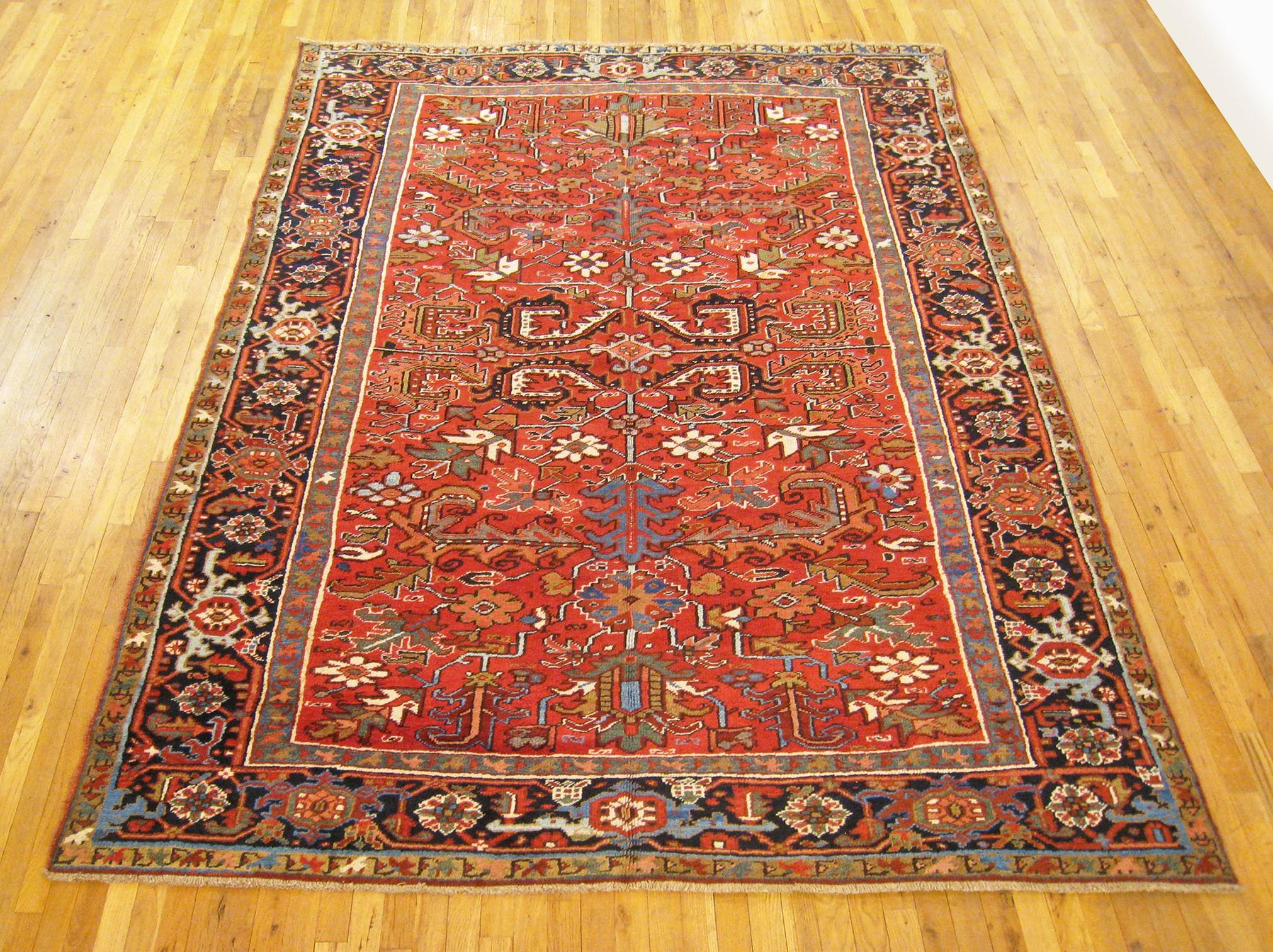 Vintage Persian Heriz oriental rug, room size.

A vintage Persian Heriz oriental rug, size 9'10