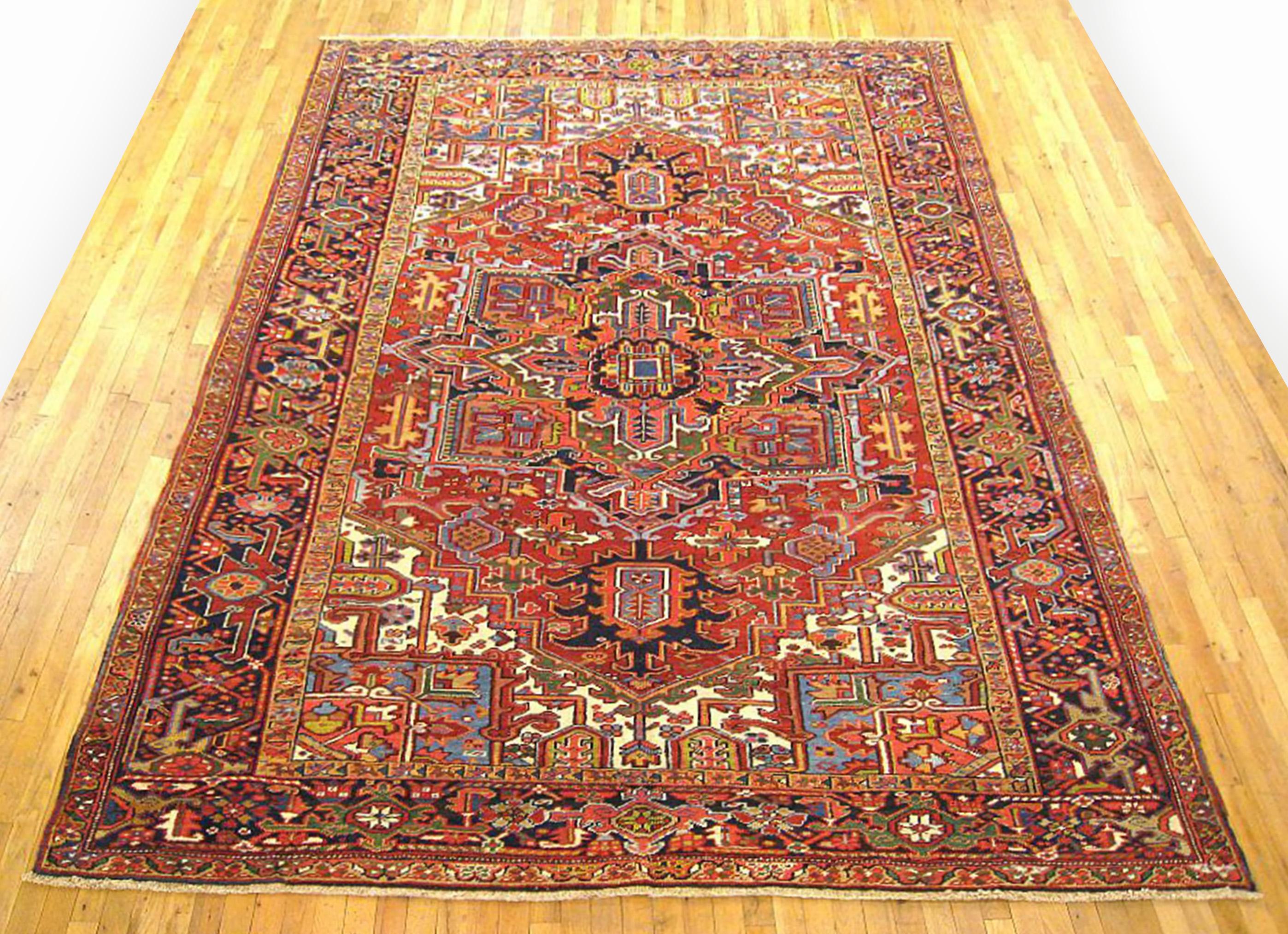 Vintage Persian Heriz oriental rug, room size

A vintage Persian Heriz oriental rug, size 11'3