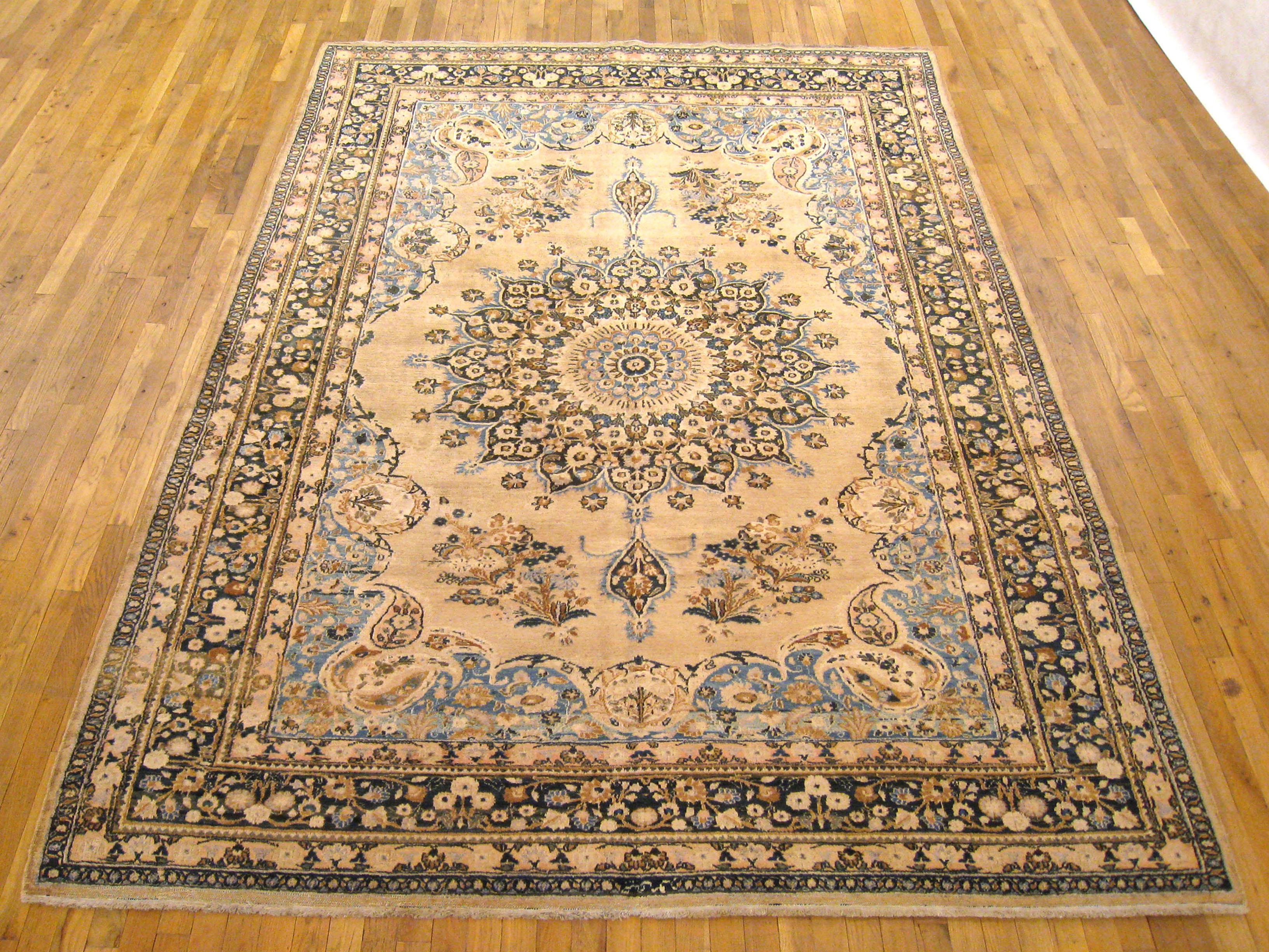 Vintage Persian meshed oriental rug, room size.

A vintage Persian Meshed oriental rug, size 10'5