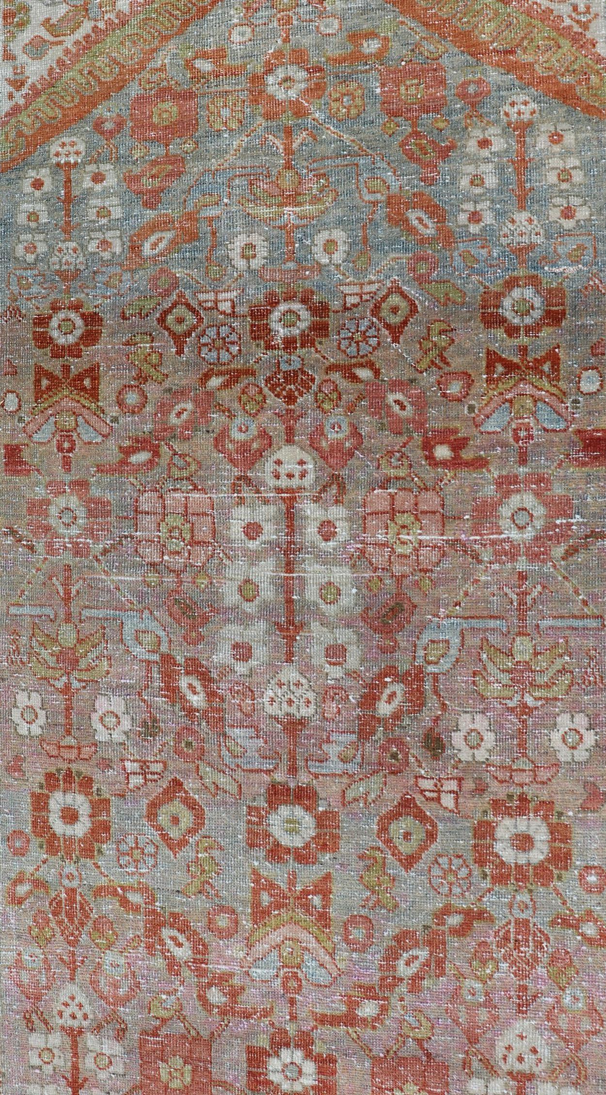 Measures 3'5 x 13'5

This wonderful Persian Mahal features a floral field and a wide array of shades and colors. The border features red and olive green. The field is filled with floral decorations rendered in coral, red, ivory, olive, light blue