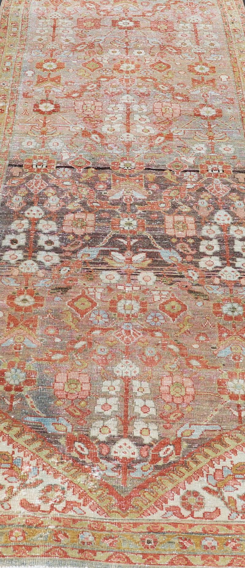 20th Century Vintage Persian Distressed Floral Mahal Runner in Red, Orange, Blue and Green For Sale