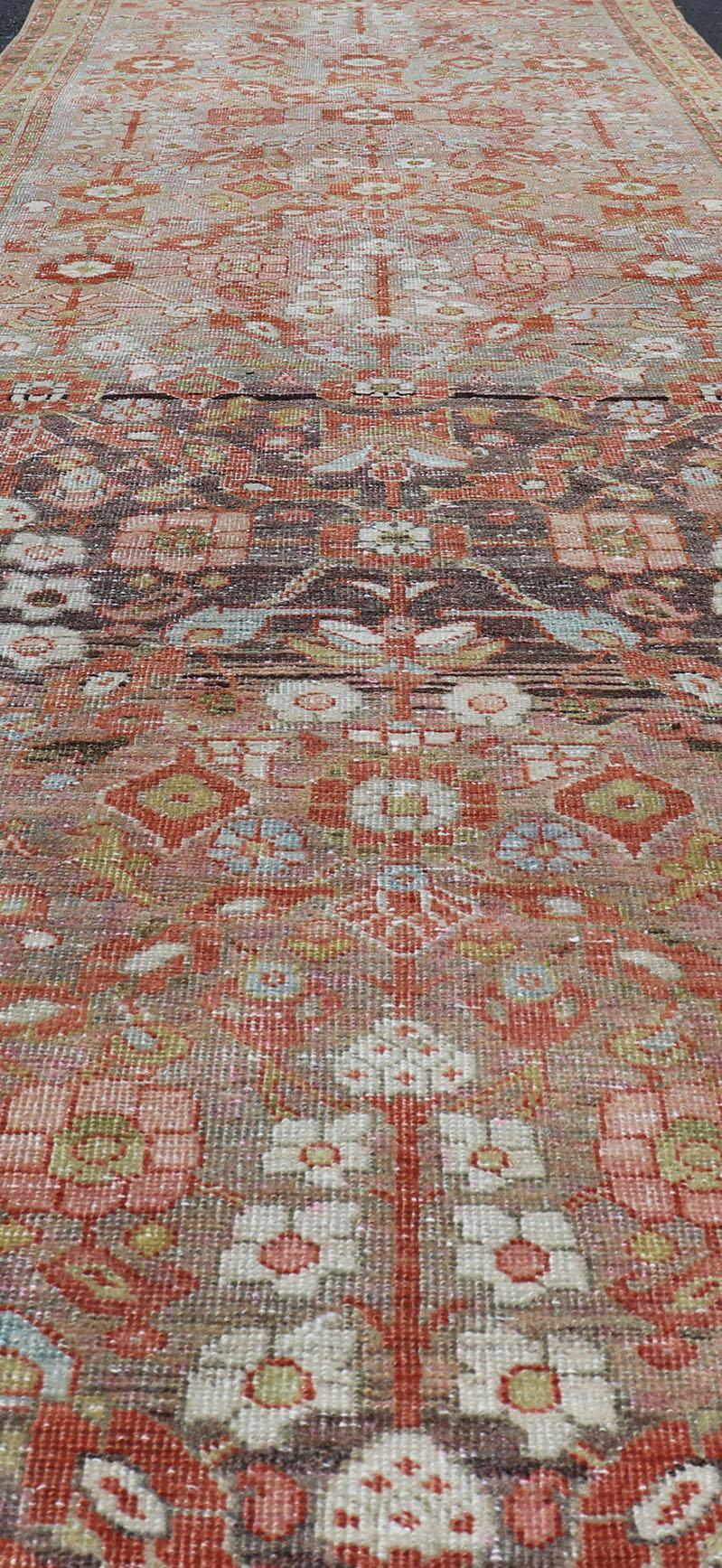Wool Vintage Persian Distressed Floral Mahal Runner in Red, Orange, Blue and Green For Sale