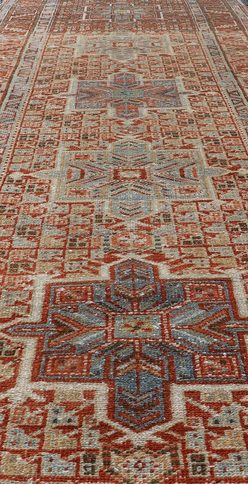 Hand-Knotted Vintage Persian Distressed Heriz Runner in Wool with Tribal Medallions For Sale