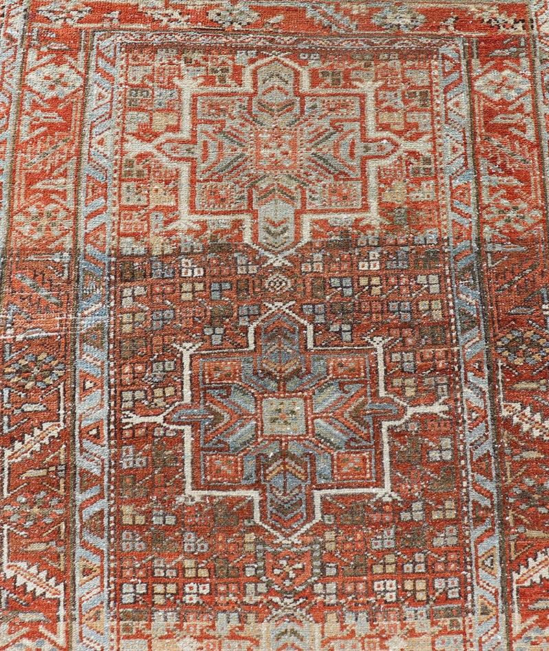 20th Century Vintage Persian Distressed Heriz Runner in Wool with Tribal Medallions For Sale