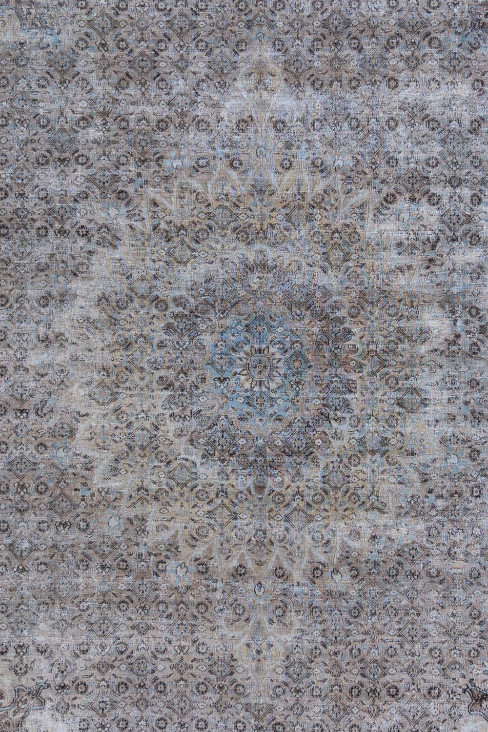 Age: Circa 1940

Colors: tan, blue, dark blue, brown 

Pile: low

Wear Notes: 4

Material: wool on cotton

Lovely textural vintage Persian Doroksh with subdued earthy colors. Good condition and safe for high traffic areas. This rug is a