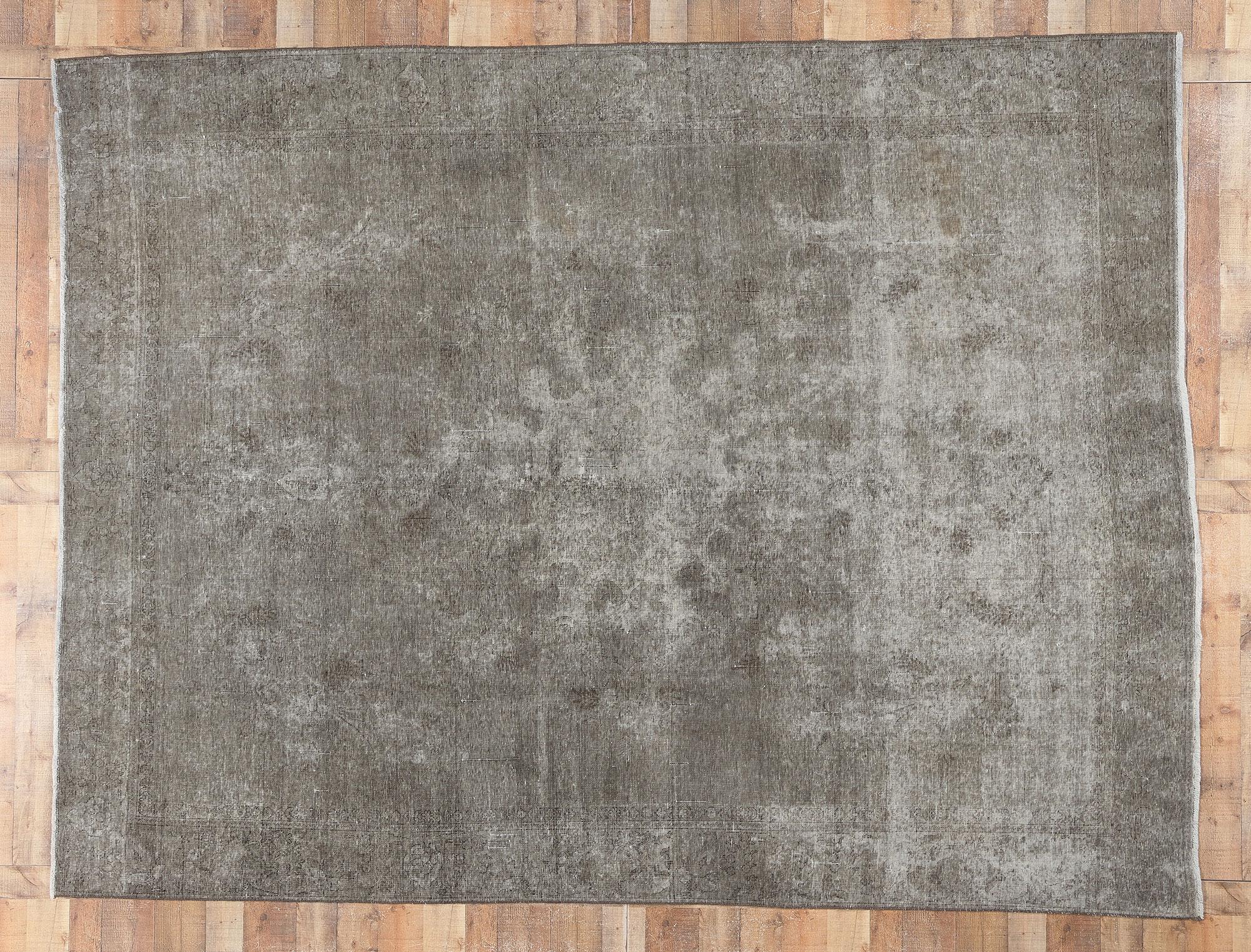 78592 Distressed Vintage Persian Overdyed Rug, 08'09 x 11'04. 
?Luxe utilitarian appeal meets sophisticated elegance in this vintage Persian overdyed rug. The modern industrial charm and monochromatic earthy colorway woven into this piece work