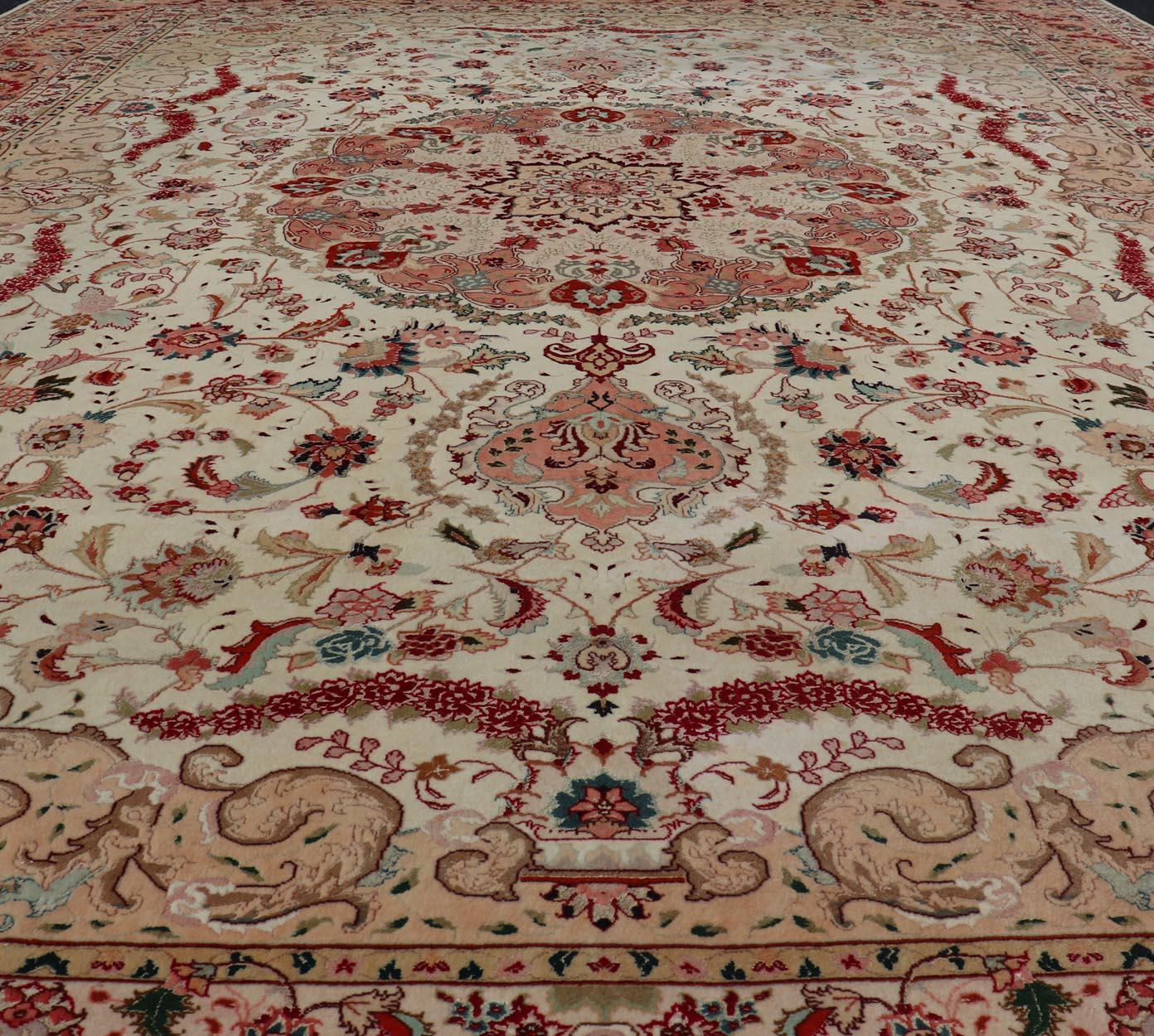  Vintage Persian Fine Tabriz Rug with Floral Medallion Design in Wool And Silk. Colorful Tabriz vintage rug from Persia with elegant medallion floral design, rug X23-0601-A, country of origin / type: Iran / Tabriz, circa 1950
Measures: 9'10 x 13'0