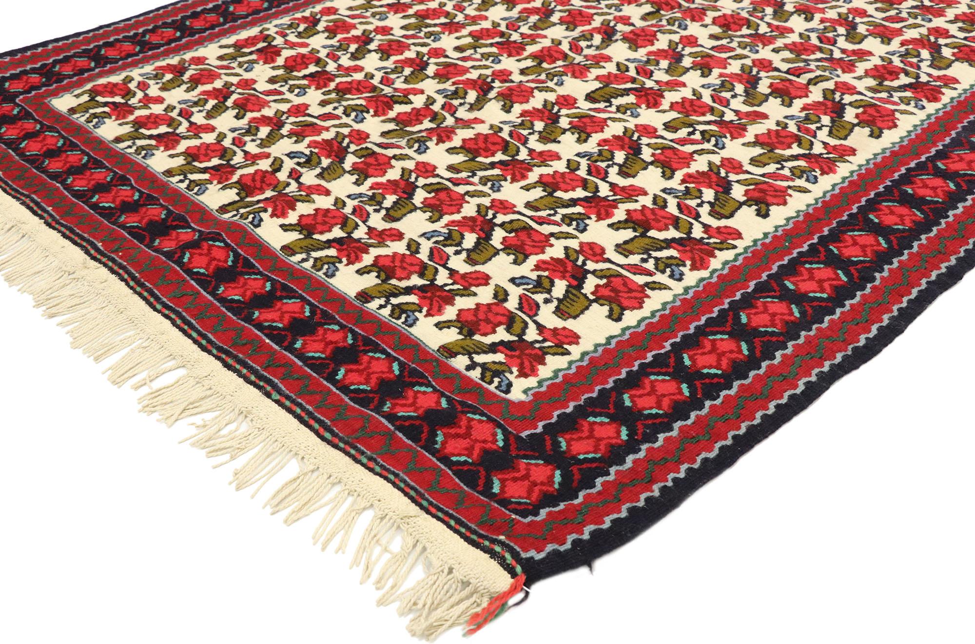 71900, vintage Persian Floral Kilim rug with English Tudor Manor House style. Warm and inviting combined with romantic connotations, this handwoven wool vintage Persian floral kilim rug beautifully embodies an English Tudor Manor House style. The
