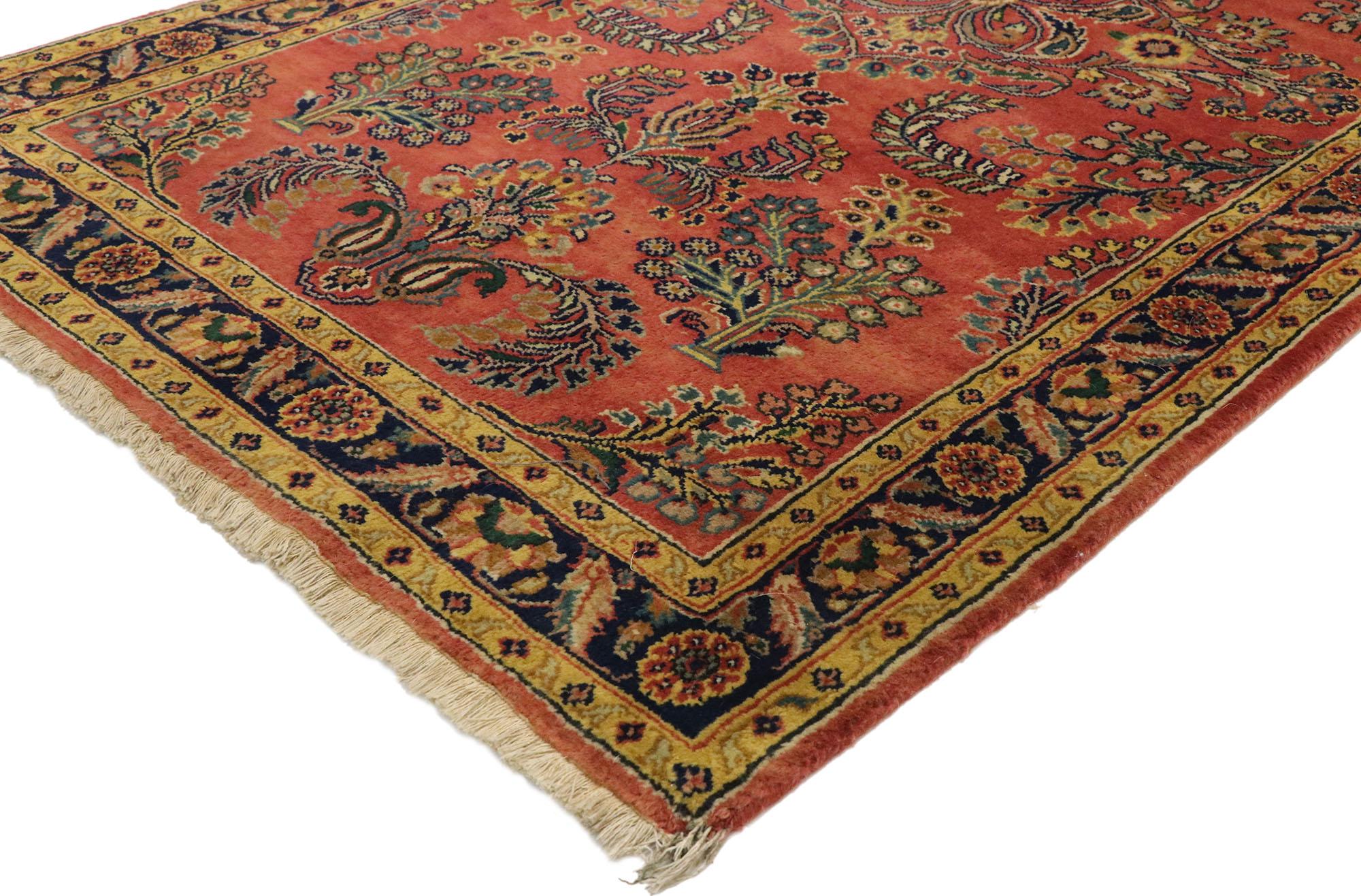 77522, vintage Persian Floral Sarouk rug with Traditional English Tudor style. With timeless appeal, refined colors, and architectural design elements, this hand knotted wool vintage Persian Sarouk rug can beautifully blend modern, traditional,