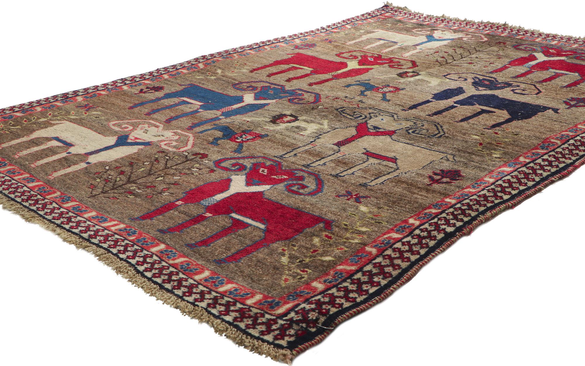 61155 Vintage Persian Gabbeh Rug, 03'10 x 05'09. Reminiscences of an exotic journey and worldly sophistication, this hand-knotted wool vintage Persian Gabbeh rug is a captivating vision of woven beauty. The eye-catching animal pictorial and earthy