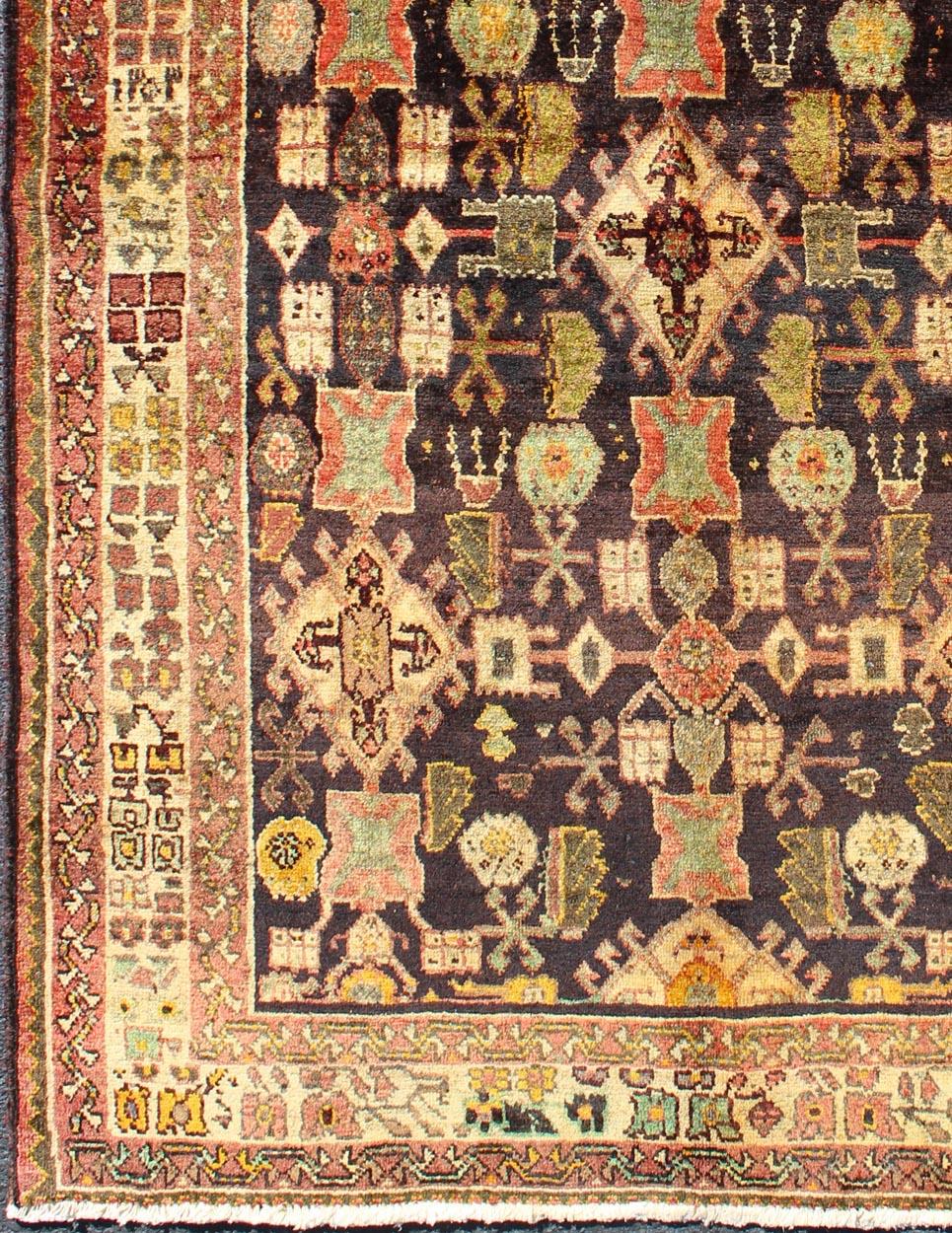 Vintage Persian Gabbeh carpet with all-over geometric Design and Midnight Field, rug h-905-07, country of origin / type: Iran / Tribal, circa 1940

This dazzling Vintage Persian Gabbeh rug bears a remarkable all-over geometric design paired with a