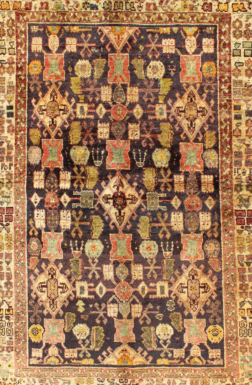 Tribal Vintage Persian Gabbeh Carpet with All-Over Geometric Design and Midnight Field For Sale