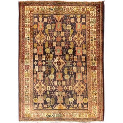 Tapis persan Gabbeh vintage avec motif géométrique sur toute sa surface et terrain de nuit