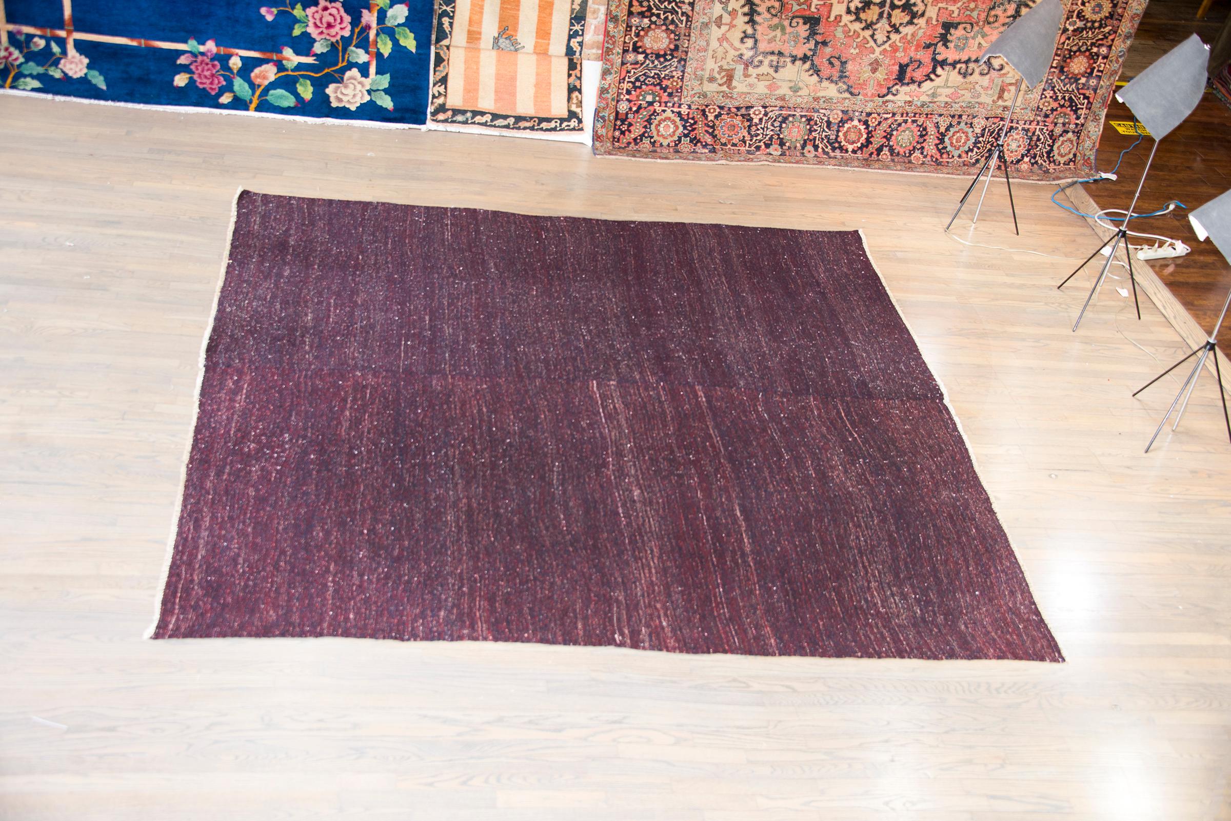 A chic and modern mid-20th century Persian Gabbeh kilim rug woven in with indigo nd crimson wool in large color blocks that are seamed together in the center.  