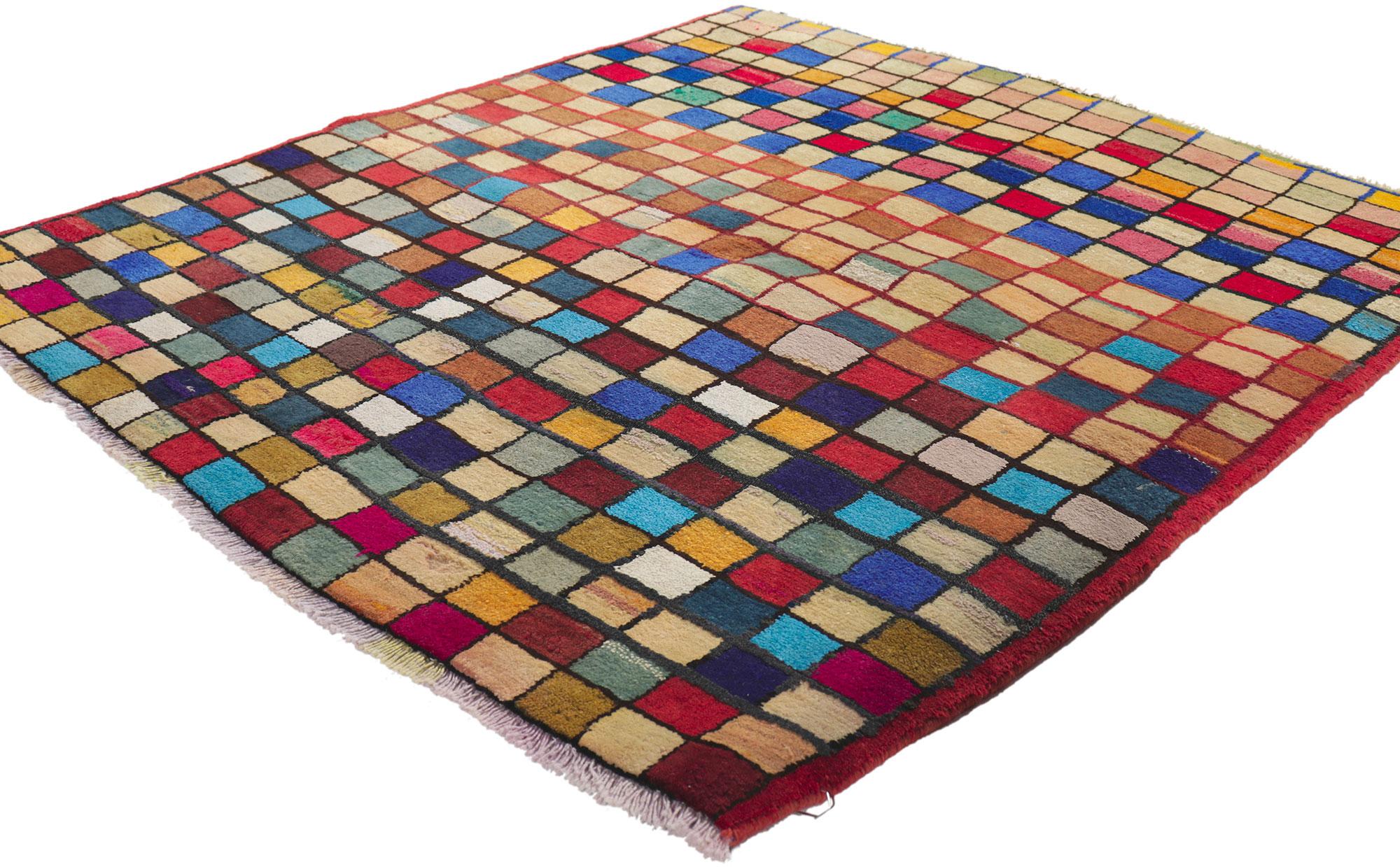 61215 Vintage Persian Gabbeh Rug, 03.05 x 04.00.
With its checkerboard design, incredible detail and texture, this hand knotted wool vintage Persian Gabbeh rug is a captivating vision of woven beauty. The eye-catching checkered pattern and lively