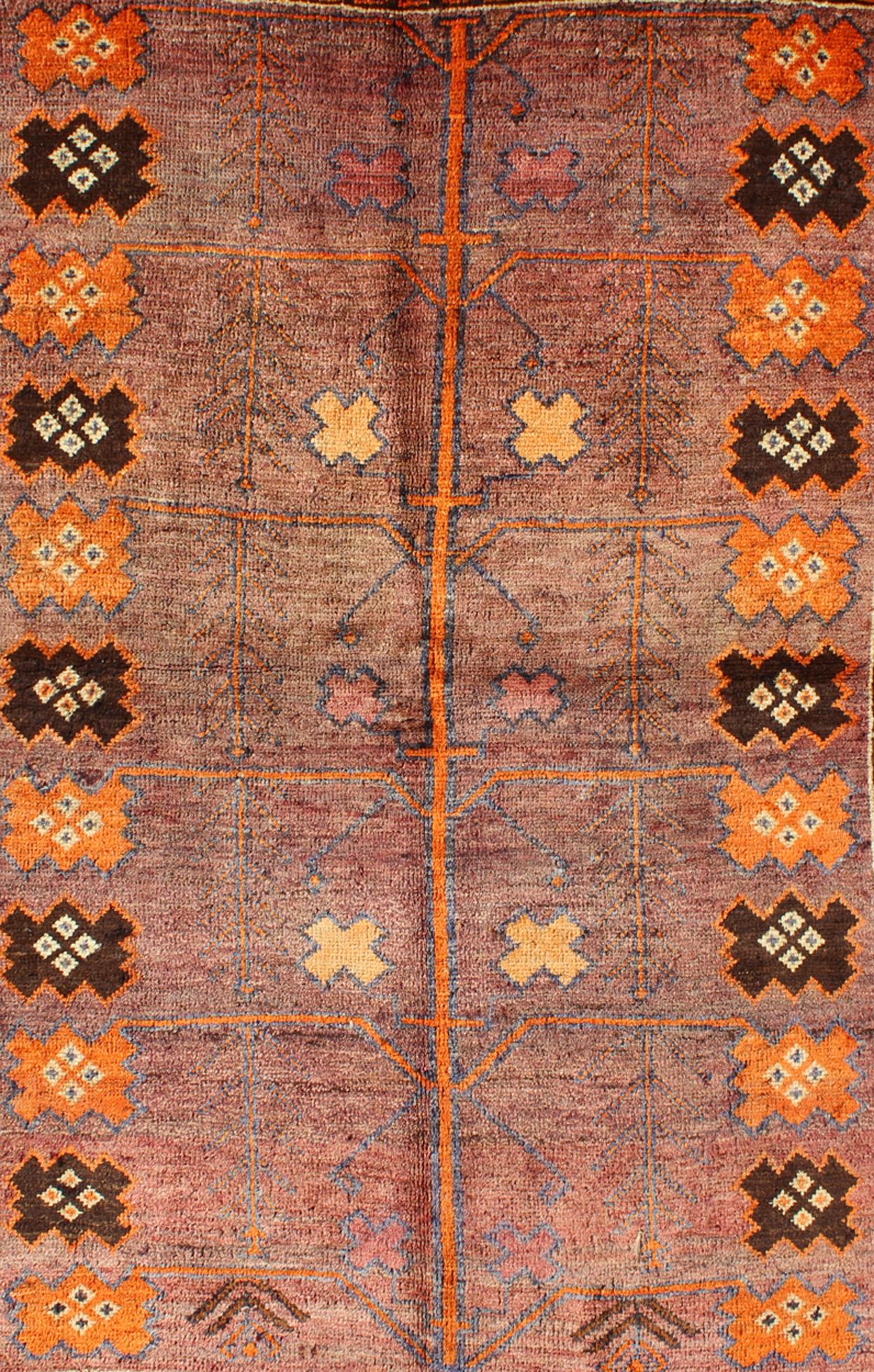 Hand-Knotted Vintage Persian Gabbeh Rug with Variegated Purple Central Field & Tribal Motifs