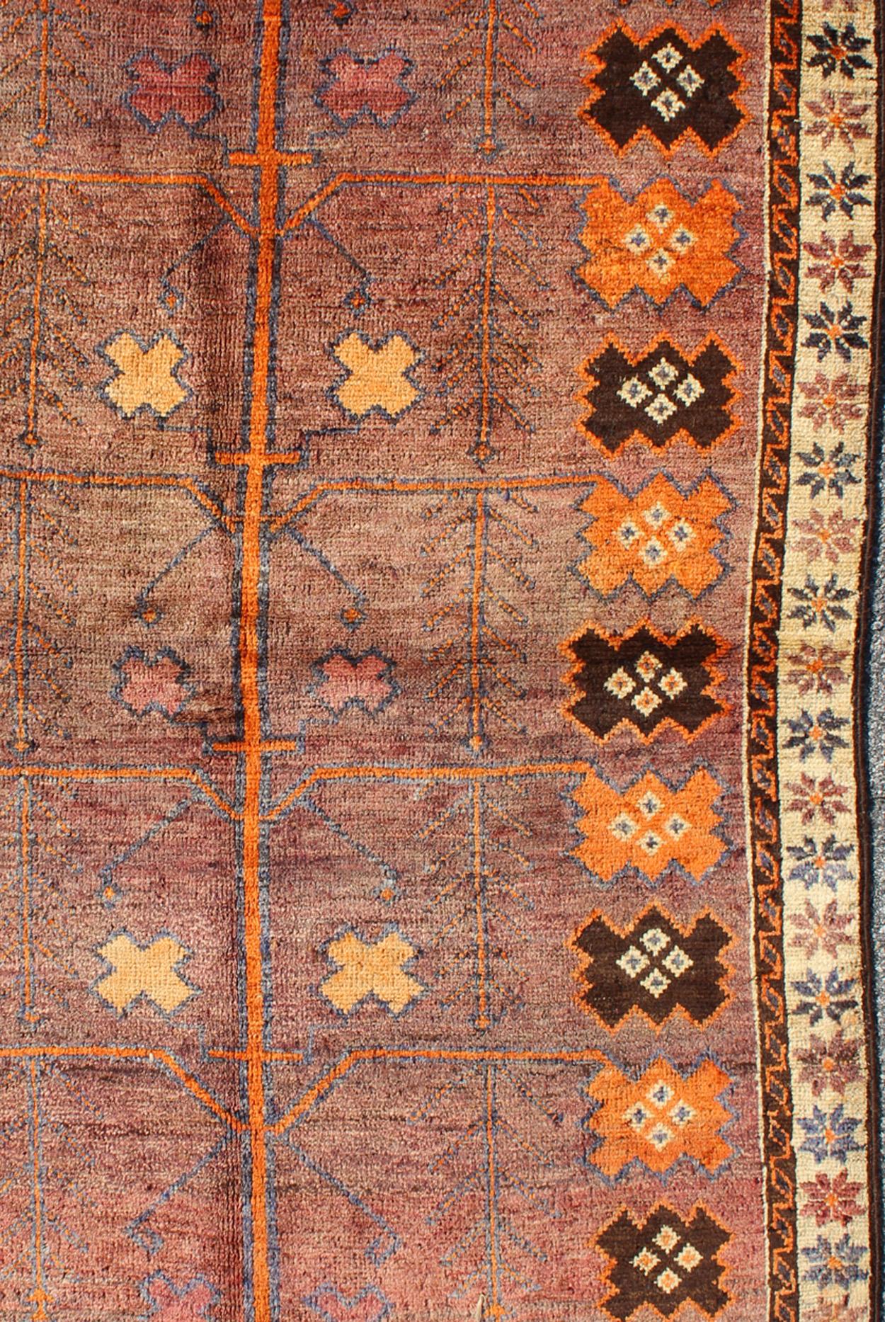 Vintage Persian Gabbeh Rug with Variegated Purple Central Field & Tribal Motifs In Excellent Condition In Atlanta, GA
