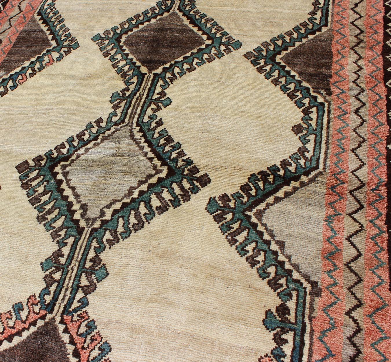 20th Century Vintage Persian Gabbeh Vintage Rug with Tribal Design in Cream, Red, and Green For Sale
