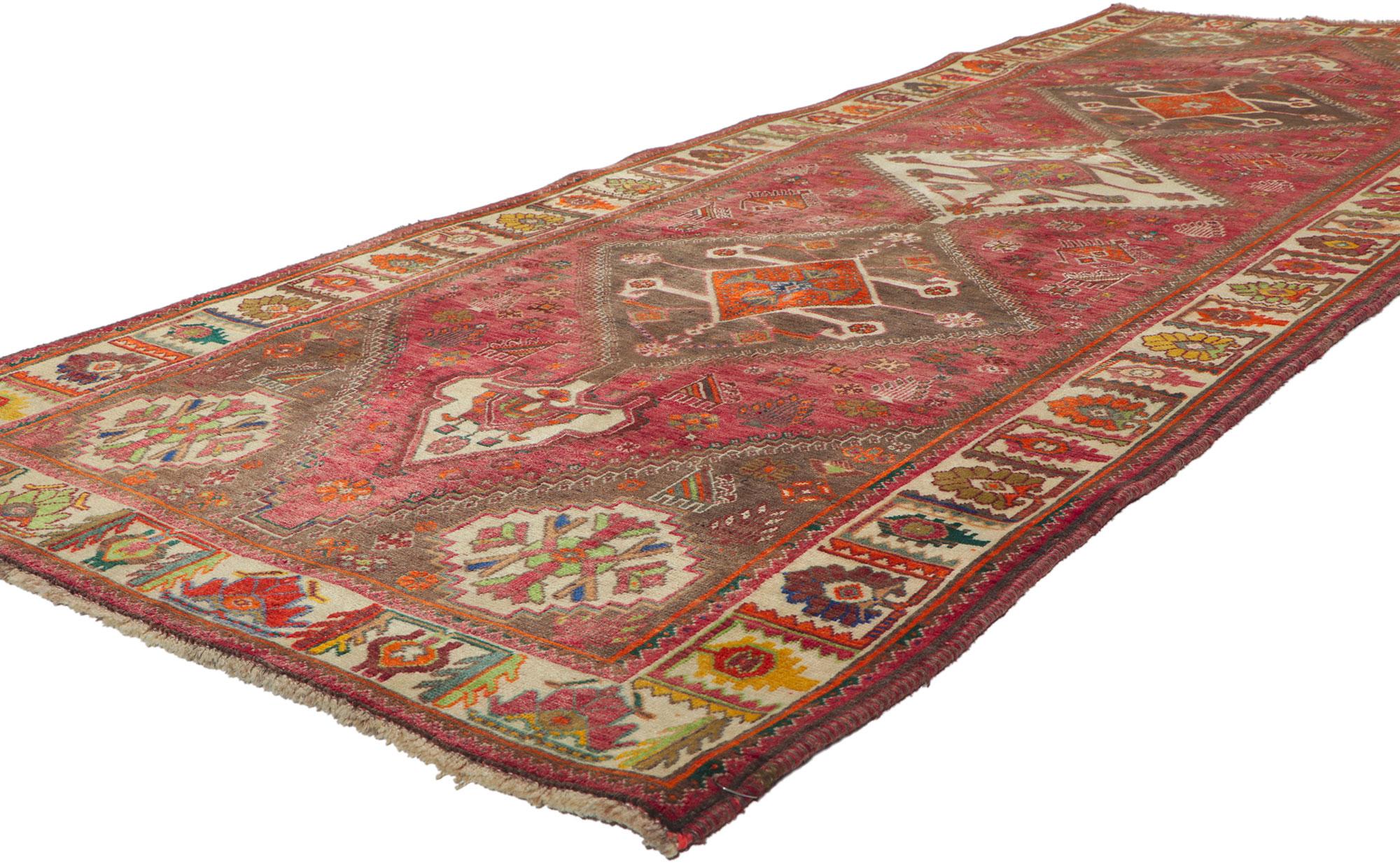 61052 vintage Persian Ghashghaei Rug, 03'08 x 09'09. Full of tiny details and a bold expressive design combined with tribal style, this hand-knotted wool vintage Persian Ghashghaei runner is a captivating vision of woven beauty. The abrashed red