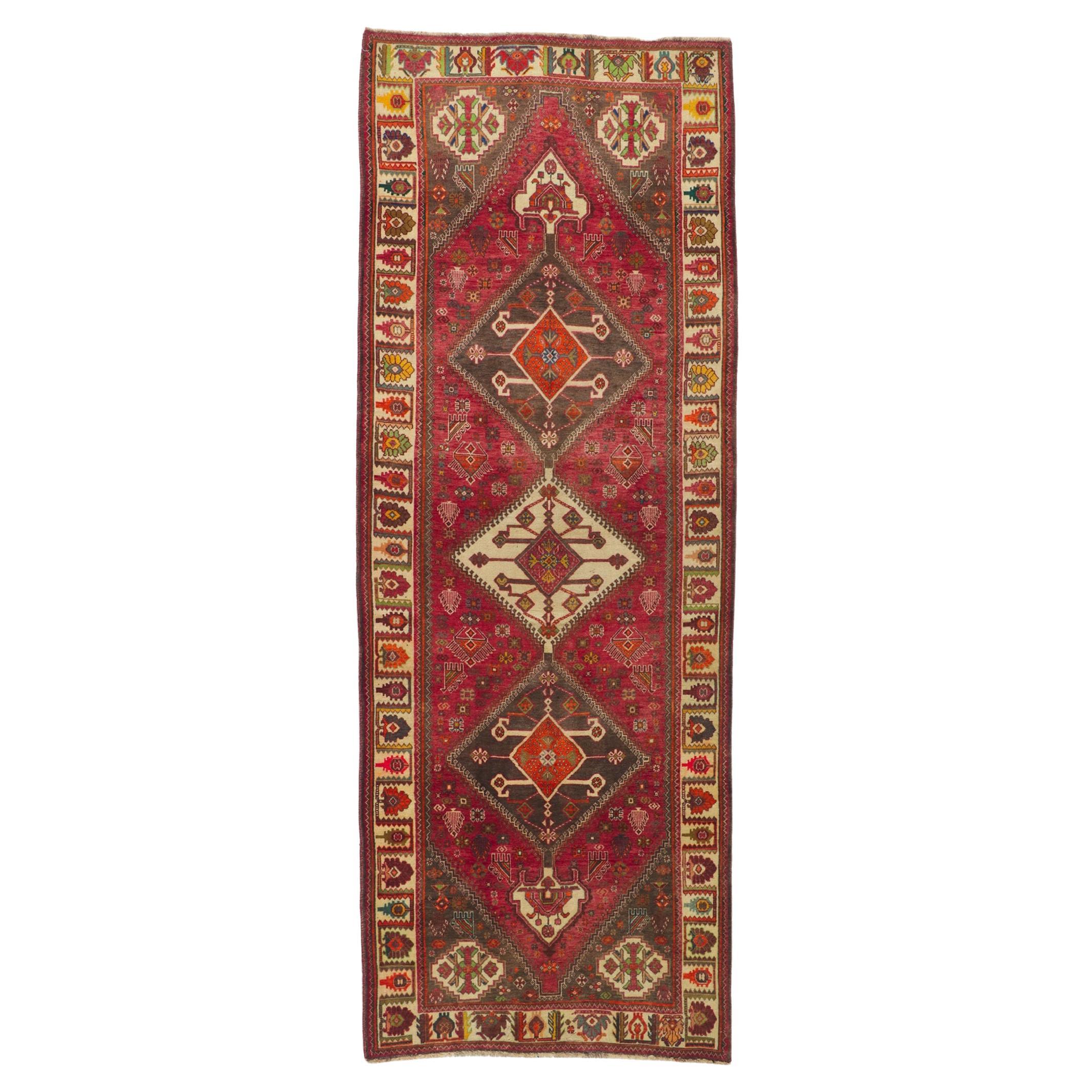 Vintage Persian Ghashghaei Runner with Tribal Style For Sale