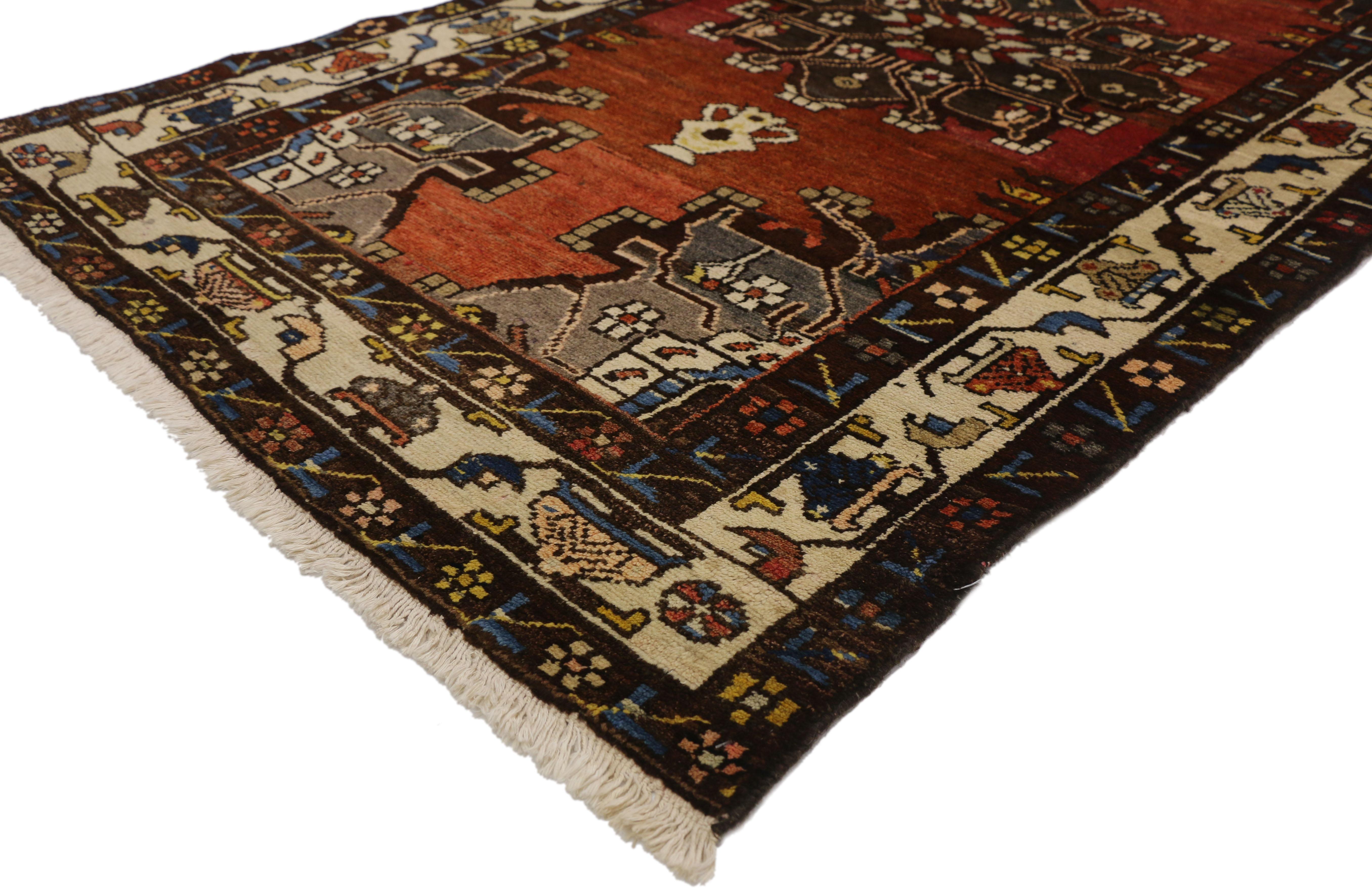 75234,Vintage Persian Hamadan Accent Rug for Foyer, Kitchen, Bathroom, or Entry Rug. This hand-knotted wool vintage Hamadan Persian rug features a central stylized floral medallion in chocolate brown with a Persian vase on each side floating in a
