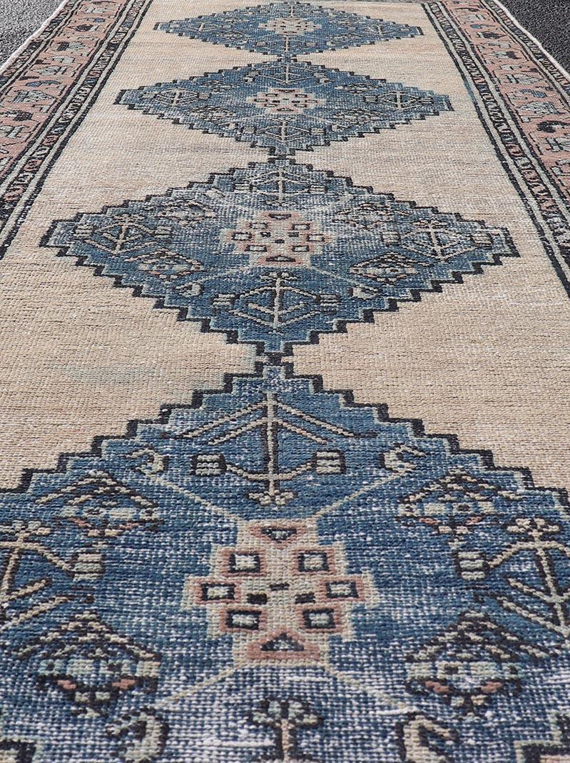 Vintage Persian Hamadan Distressed Runner With Medallion Design In Navy Blue. Keivan Woven Arts / rug MSE-1416, country of origin / type: Iran / Hamadan, circa 1960. 
Measures: 3'5 x 9'7 
This vintage Persian Hamadan carpet features a refined palate