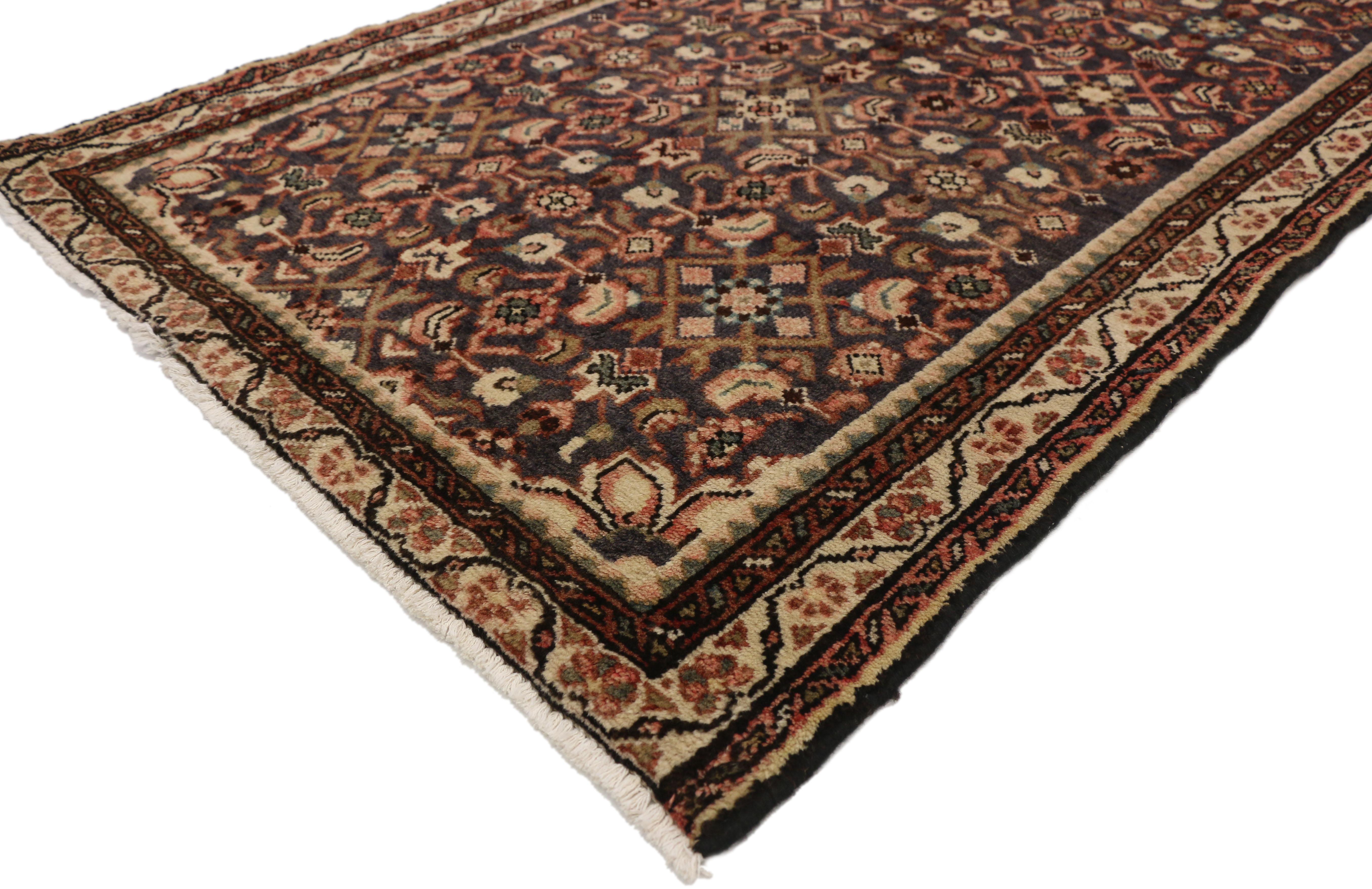 77289, vintage Persian Hamadan hallway runner with rustic Arts & Crafts style. This hand knotted wool vintage Persian Hamadan runner features a stepped diamond medallion floating in the center of an abrashed field. The lozenge medallion sports an