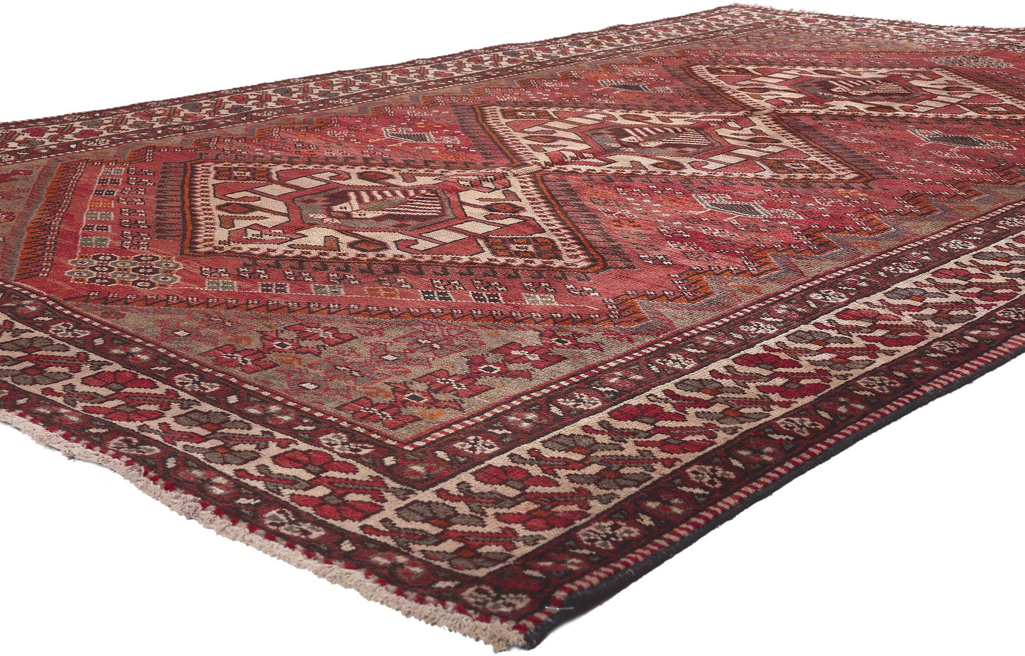 75879 Vintage Persian Hamadan Rug, 06'04 x 09'10.
Nomadic charm meets decidedly dramatic in this vintage Persian Hamadan rug. The intrinsic tribal design and bold earthy hues woven into this piece work together creating a warm and inviting yet