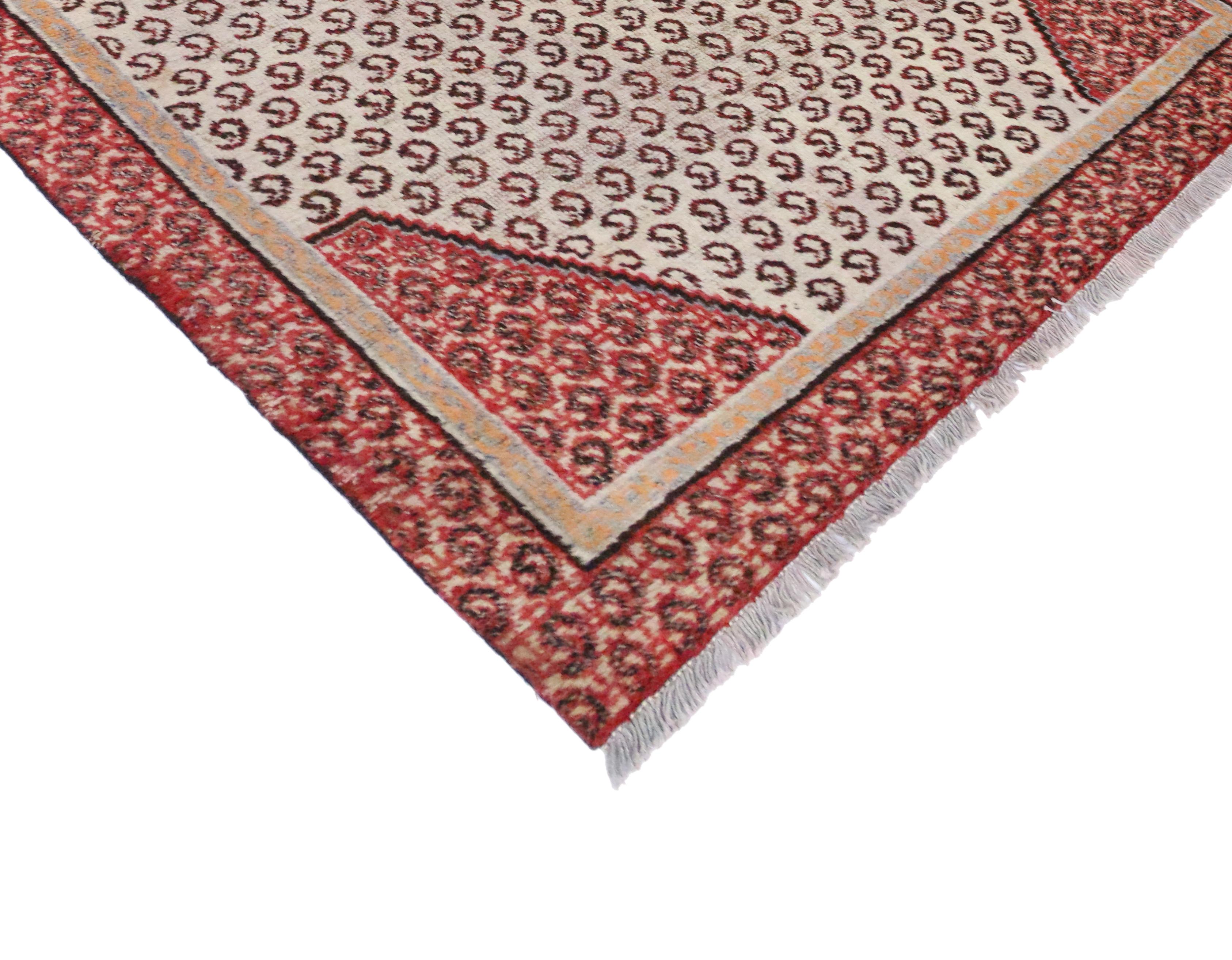 76260, vintage Persian Hamadan rug with all-over boteh. This hand-knotted wool vintage Persian Hamadan rug features an all-over boteh pattern with a central diamond medallion. It is enclosed with red corner spandrels and border both composed with an