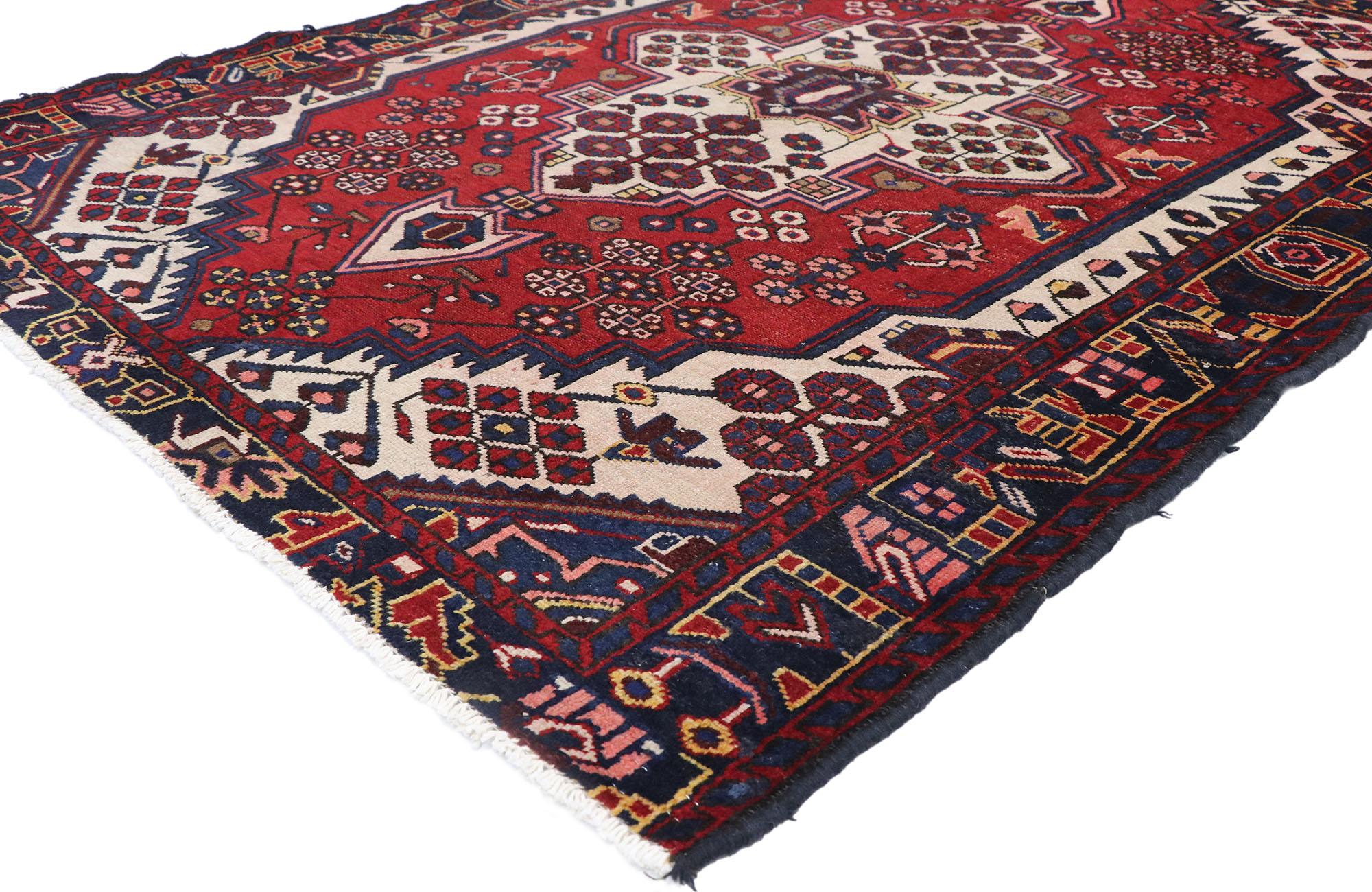 77713 vintage Persian Hamadan rug with Jacobean style 04'07 x 06'01. With its red hues and beguiling beauty, this hand-knotted wool vintage Persian Hamadan rug will take on a curated lived-in look that feels timeless while imparting a sense of