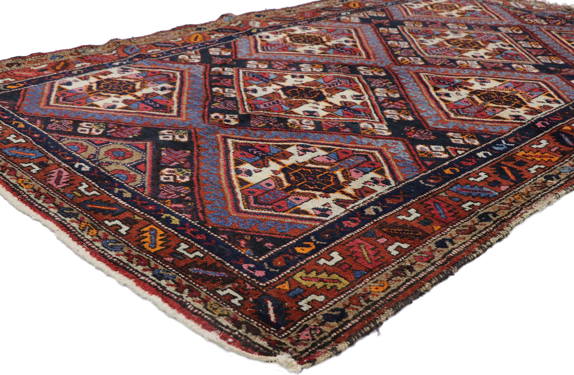 78032 Vintage Persian Hamadan rug with Tribal Style 04'04 x 06'05. Full of tiny details and a bold expressive design combined with lively colors and tribal style, this hand-knotted wool vintage Persian Hamadan rug is a captivating vision of woven