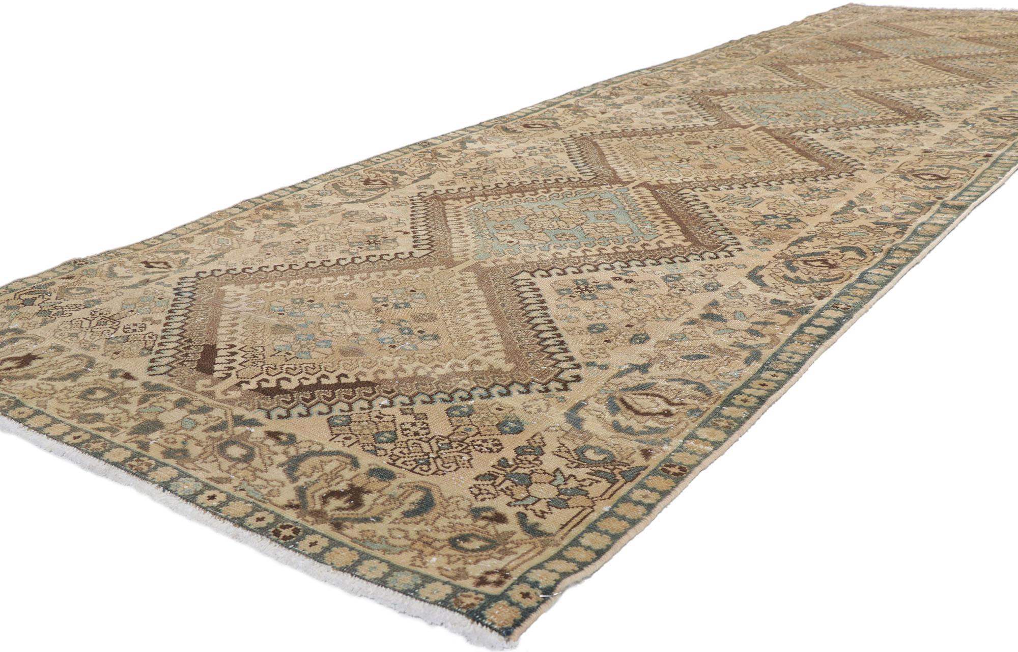 61026 Vintage Persian Hamadan Rug, 03'10 x 12'07. In the whimsical dance of nomadic allure and rustic finesse, say hello to this distressed antique Persian Hamadan rug runner—a floor whisperer of sorts, regaling tales of tribal charisma and earthy