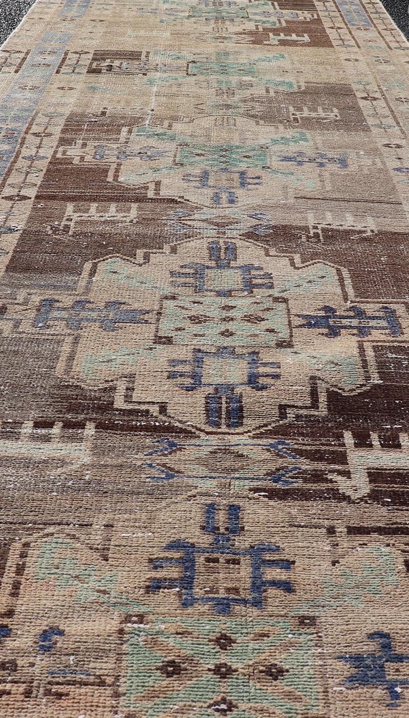 Vintage Persian Hamadan Runner in Warm Tones of Purple, Brown and Taupe. Country of Origin: Iran; Type: Hamedan; Design: Floral, Persian Floral, All-Over: rug MSE-1251, Keivan Woven Arts. 
Measures: 3'4 x 9'9
This vintage Persian runner features a