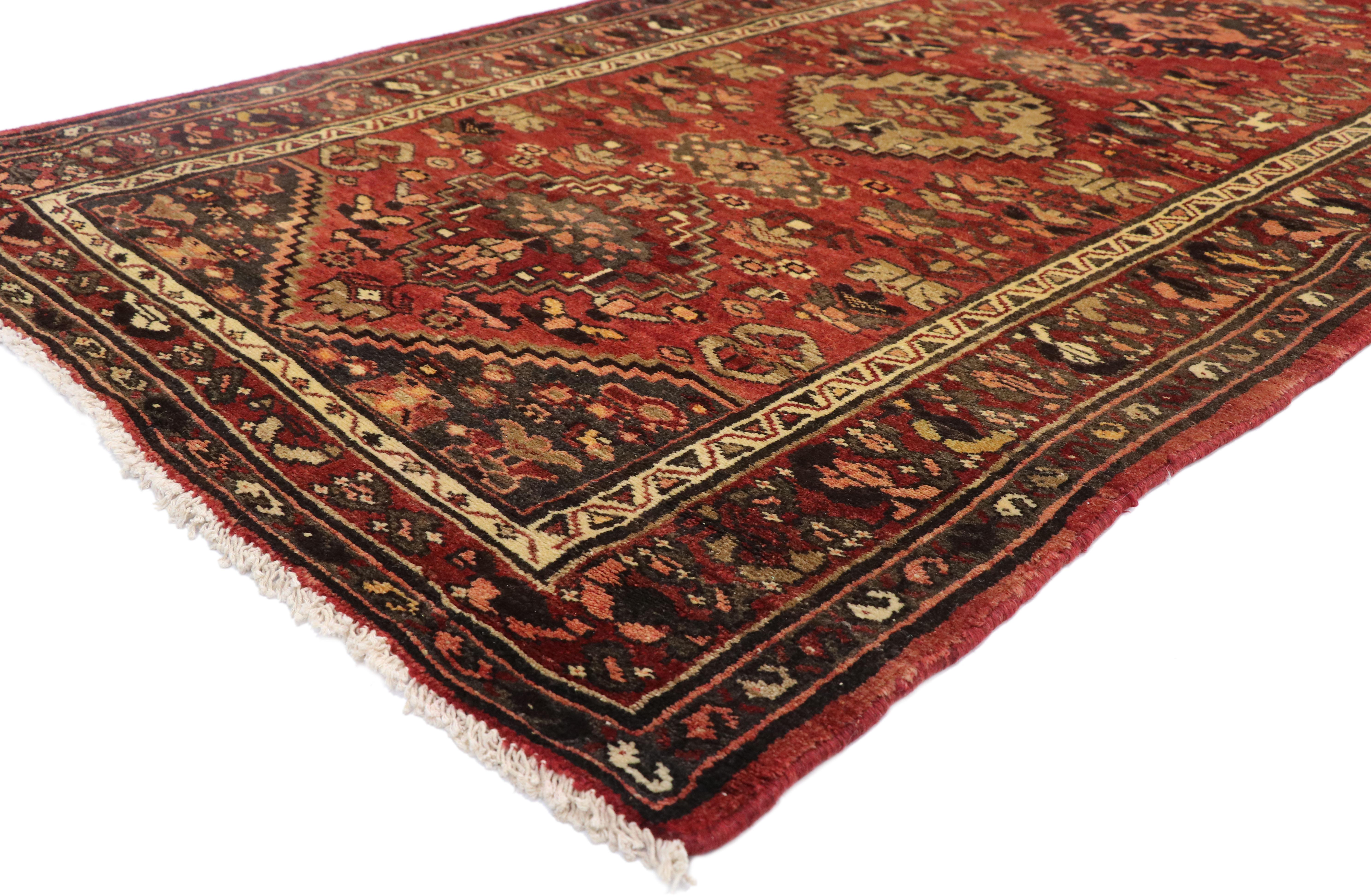 75364 vintage Persian Hamadan runner with Jacobean style, hallway runner. With its warm, rich colors, Jacobean style, and ornate detailing, this hand knotted wool vintage Persian Hamadan runner is well-balanced and poised to impress. It features a