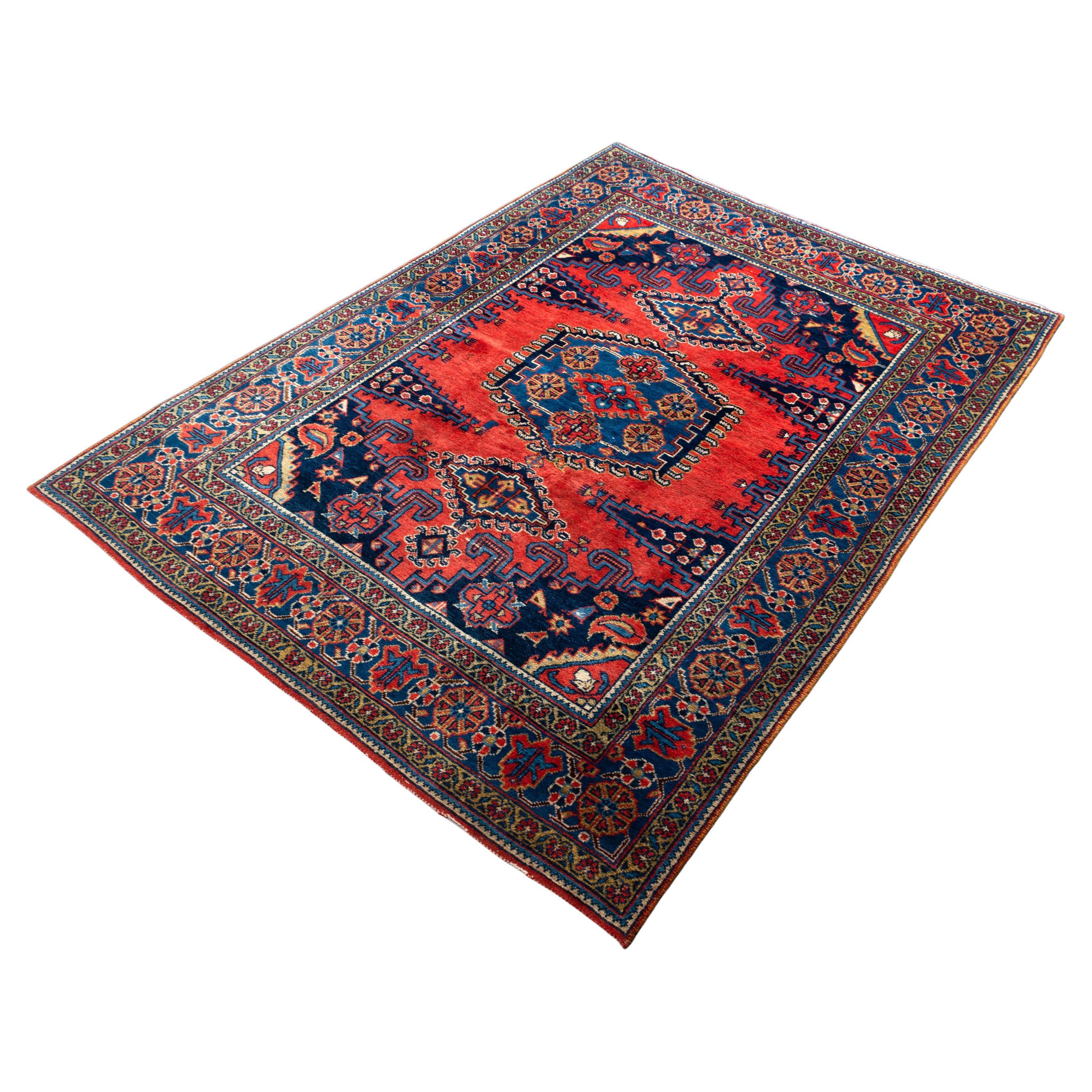 A Persian Hamadan wiss hand-knotted rug 
Geometric Central Medallion
Beautiful vibrancy of colour
Persian rug on a thick wool pile on a cotton foundation
Handmade
Mid 20th century

Measures: 161 x 229cm

In excellent condition commensurate