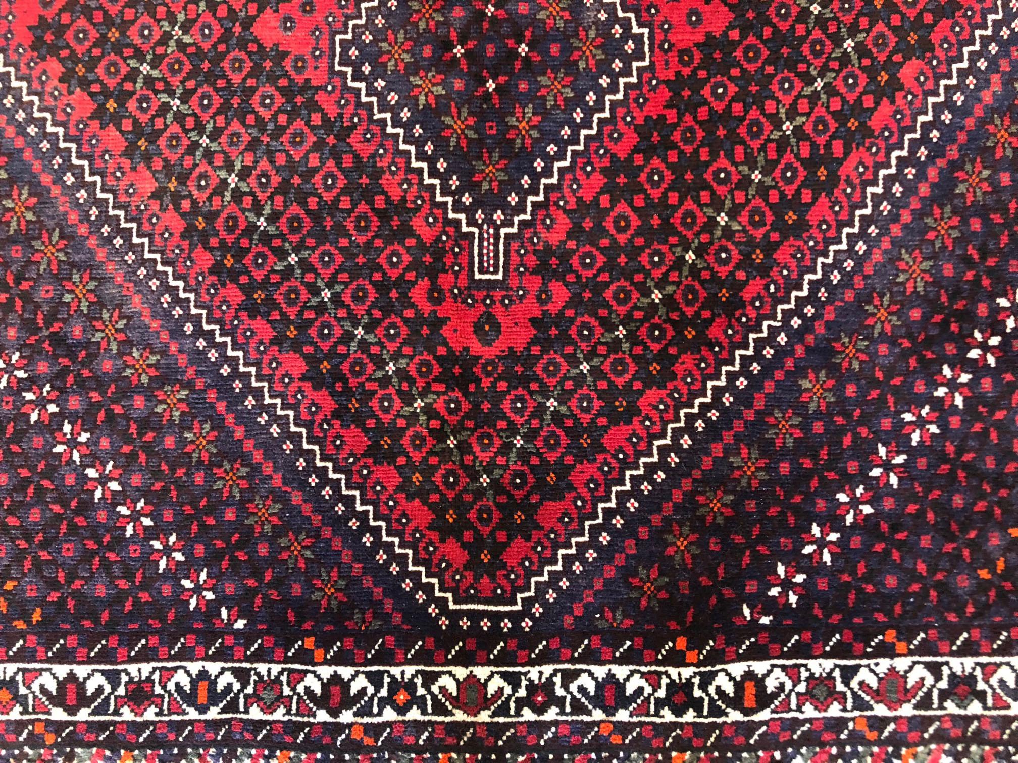 Hand-Knotted Vintage Persian Hand Knotted Tribal Red Repeated Medallion Shiraz Rug circa 1960 For Sale