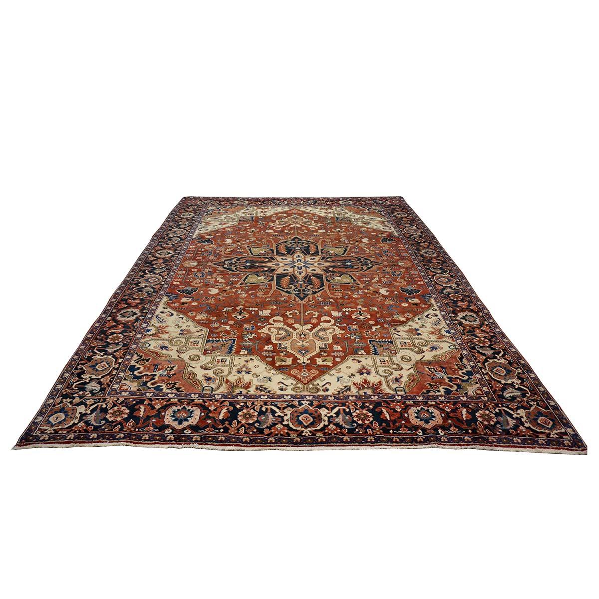 Ashly Fine Rugs presents a 1950s Vintage Persian Heriz 10x13 Handmade Area Rug. Heriz rugs are well-known for their bold geometric patterns and vibrant colors, often featuring shades of red, blue, and ivory. These rugs typically showcase a central
