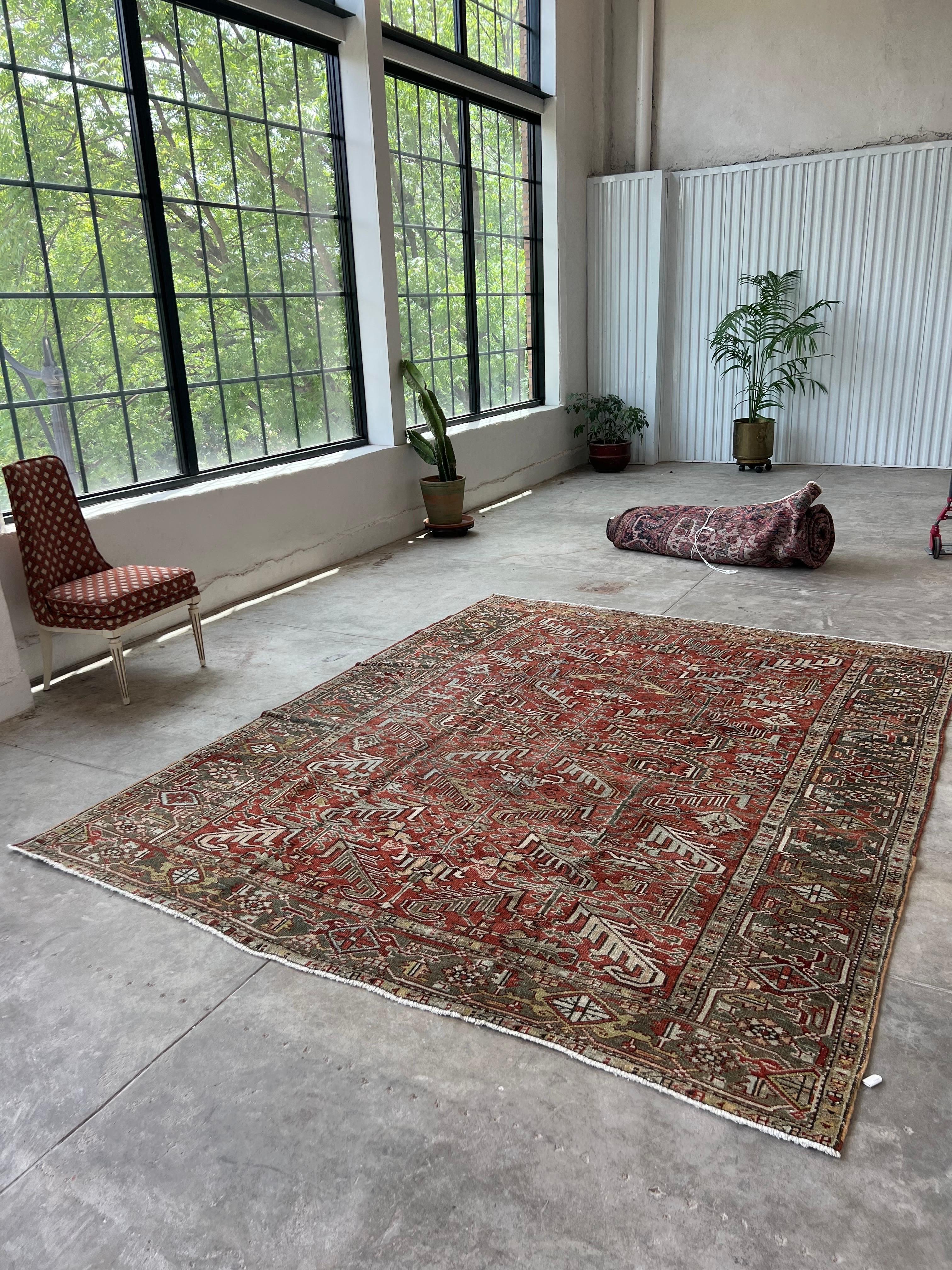 7’6 x 9’6

Beautiful vintage Persian Heriz rug with an all over pattern. The sage blue/green border is wonderful! Hand-knotted wool rugs have a light side and dark side depending on which direction you're viewing the nap of the wool yarn! This rug