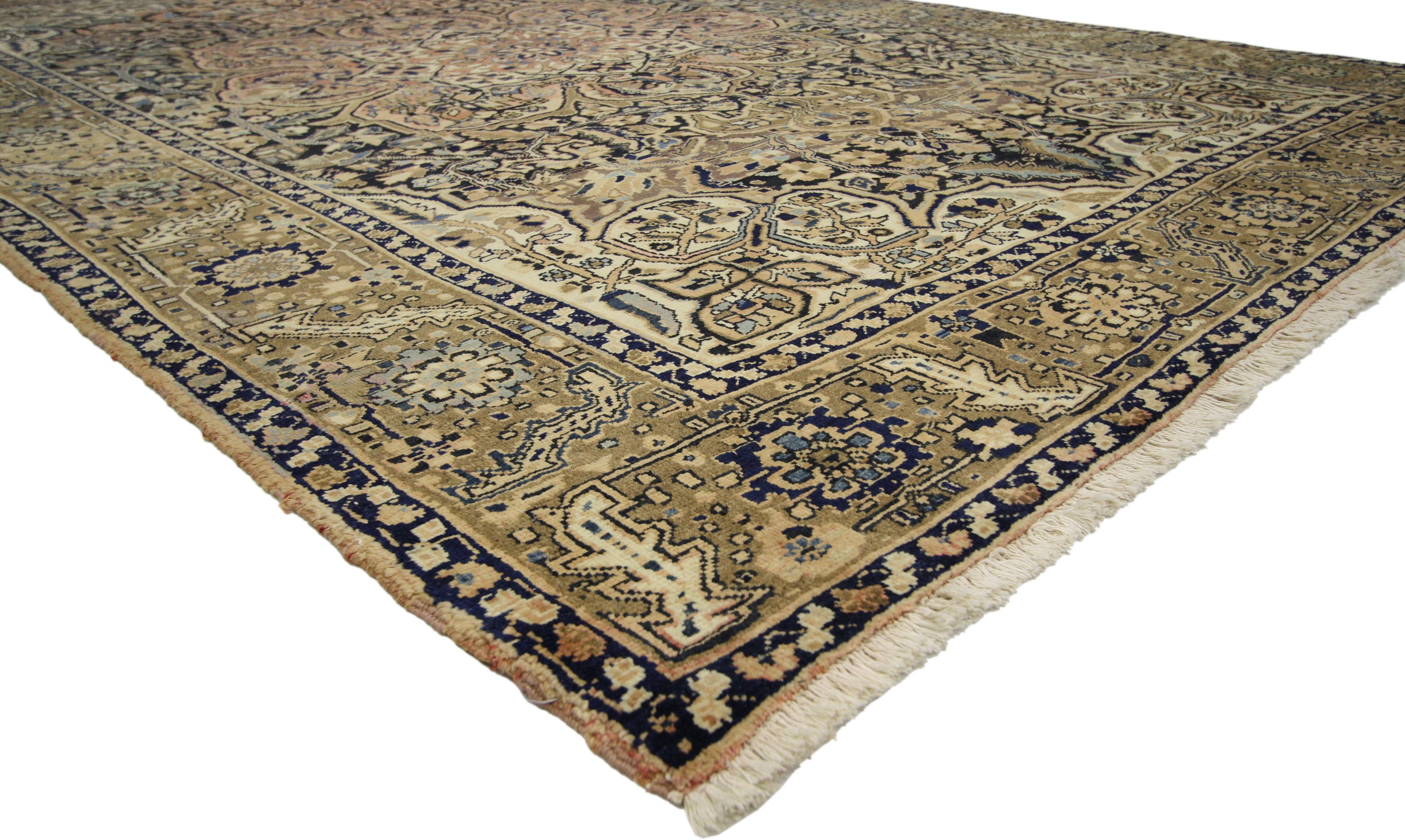 76316 Vintage Persian Heriz Area rug with Arts & Crafts Artisan style. This hand knotted wool vintage Persian Heriz rug features an concentric octofoil medallion with serrated palmette anchor pendants. The octagram medallion is surrounded by an