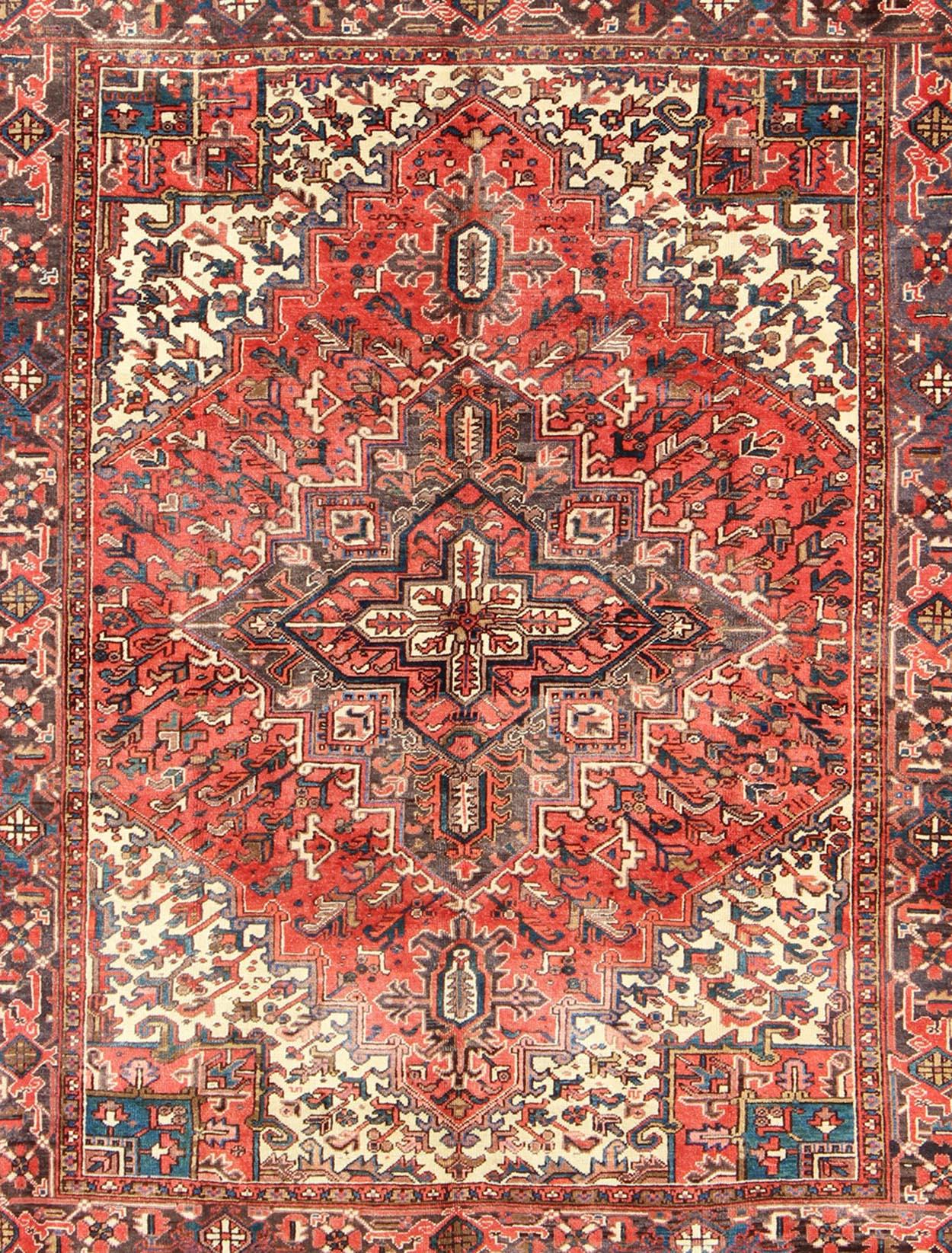 Heriz Serapi Vintage Persian Heriz Carpet with Geometric Medallion in Rust and Denim Blue
