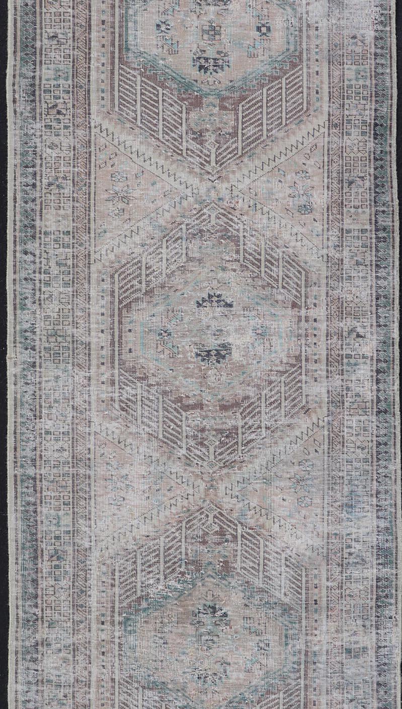 Vintage Persian Heriz Distressed Rug with Muted Colors & Medallion Design In Distressed Condition For Sale In Atlanta, GA