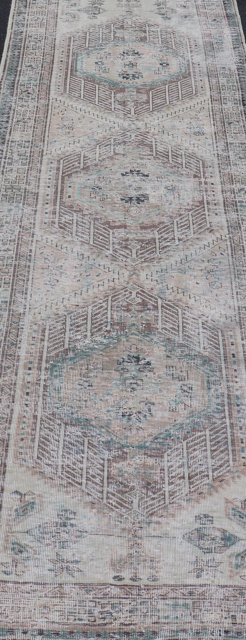 Vintage Persian Heriz Distressed Rug with Muted Colors & Medallion Design For Sale 1