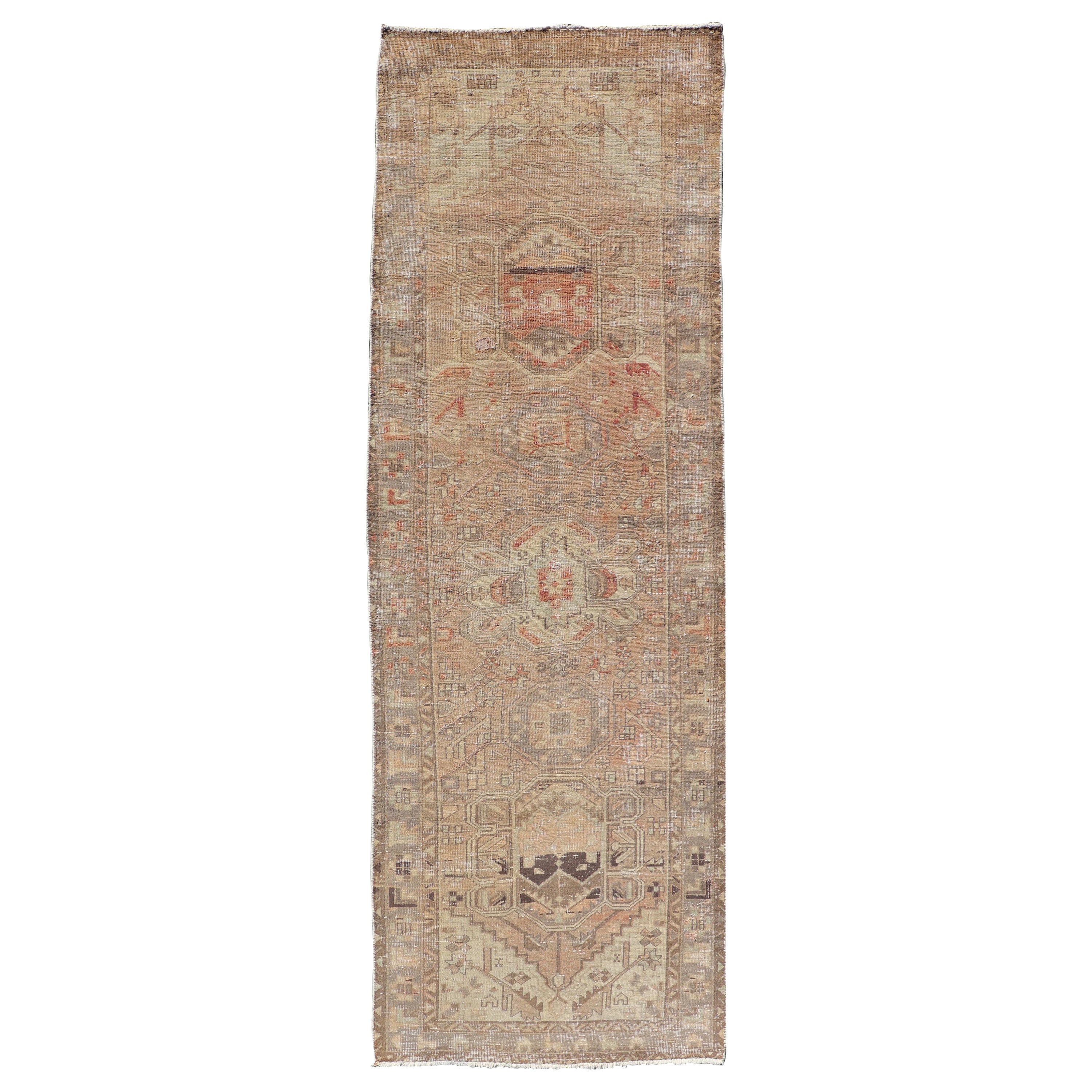 Vintage Persian Heriz Distressed Runner In Earthy Tones with Medallion Design For Sale