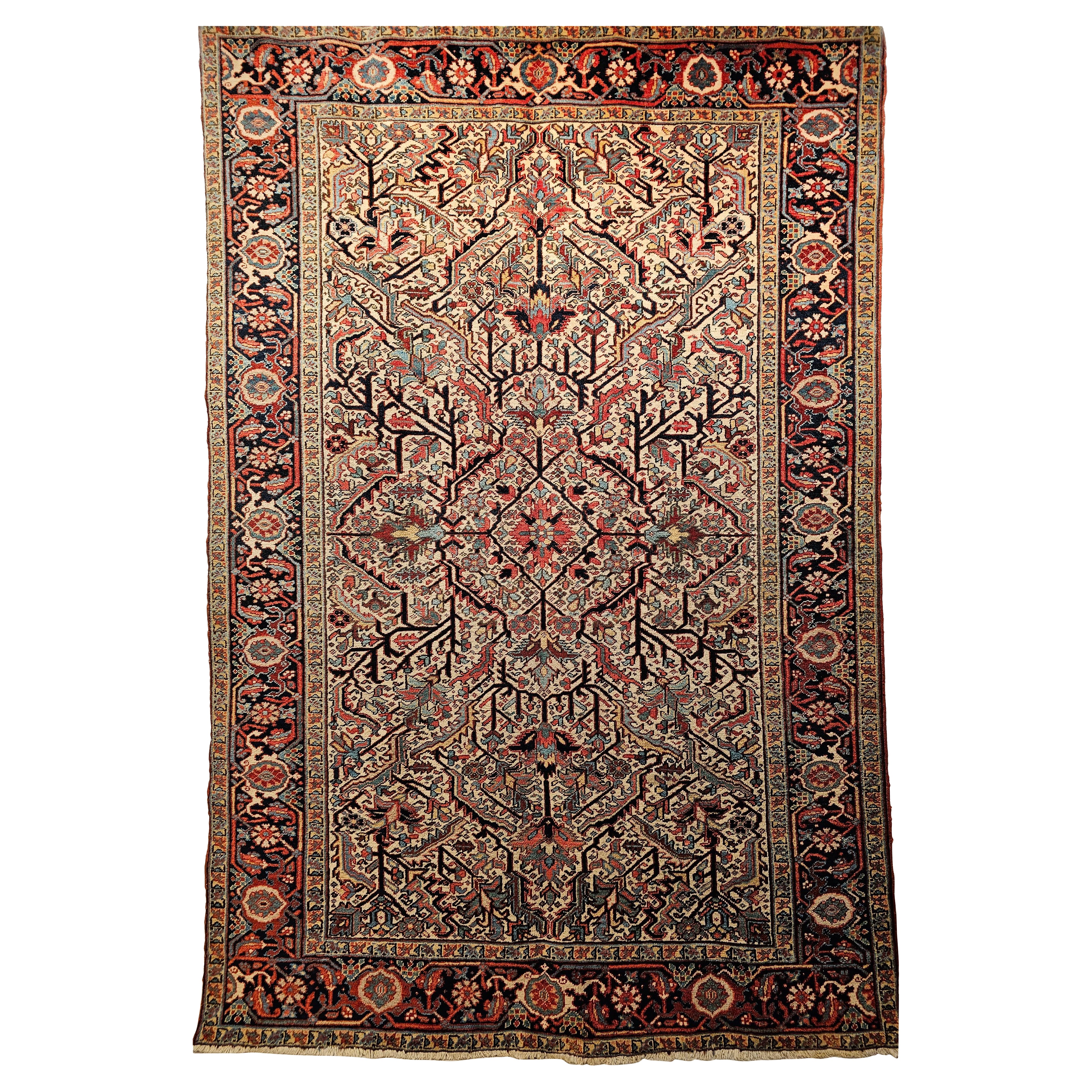 Heriz persan vintage à motif géométrique en ivoire, bleu, vert, bleu marine